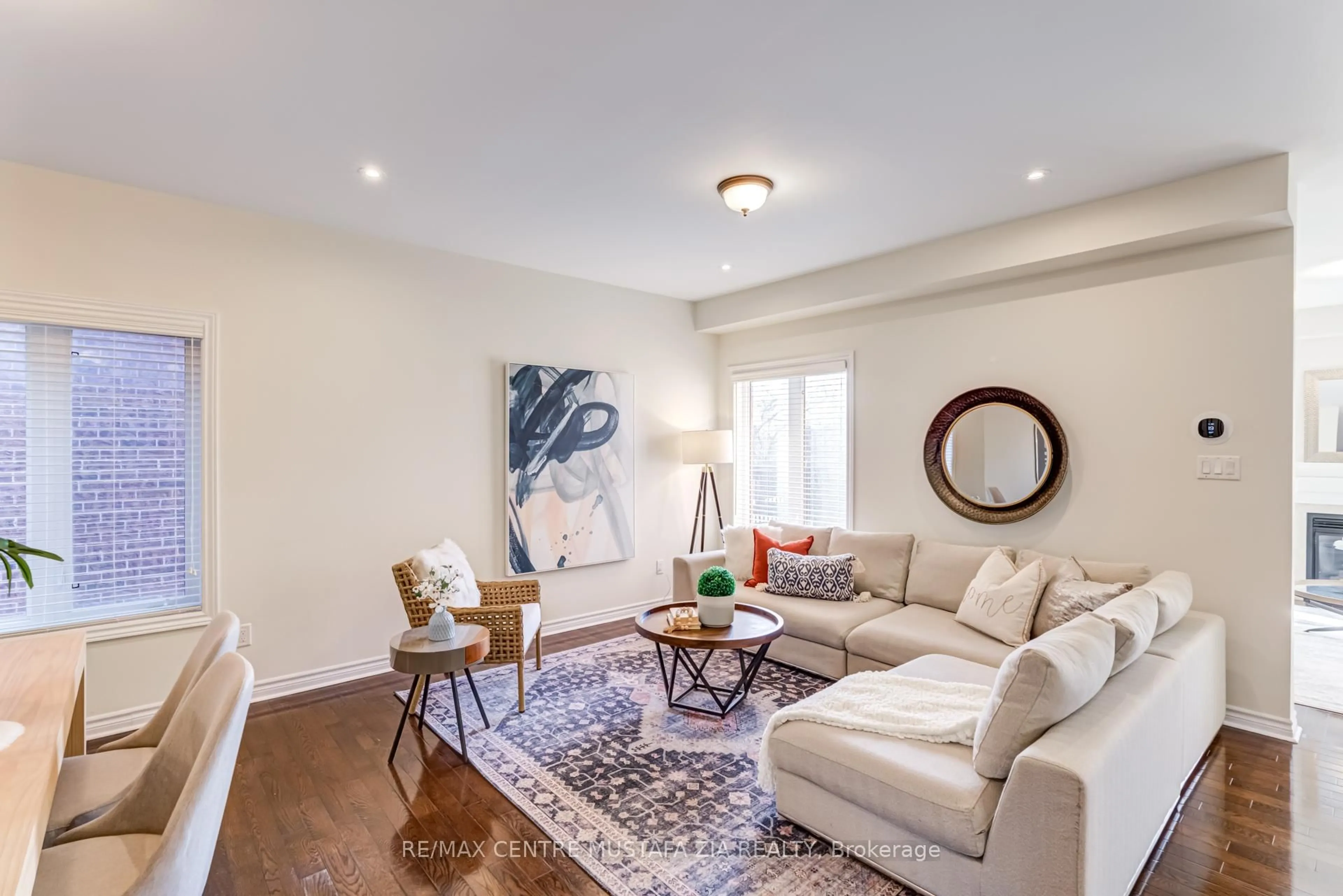Living room with furniture, wood/laminate floor for 28 Rossini Dr, Richmond Hill Ontario L4E 0R5