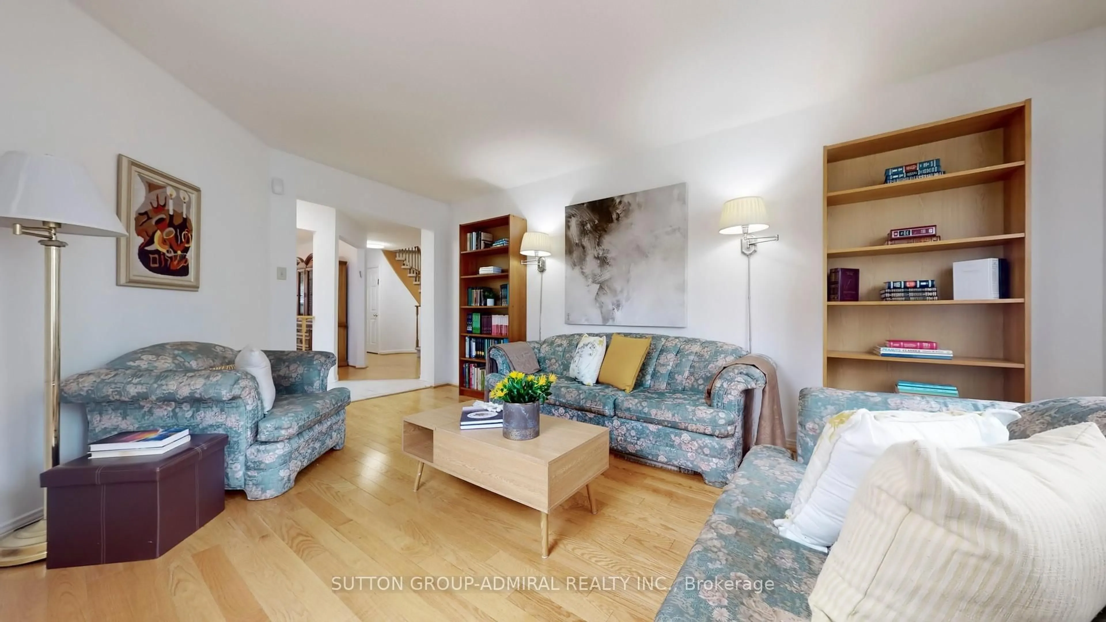 Living room with furniture, wood/laminate floor for 27 Thornbury Circ, Vaughan Ontario L4J 5C1