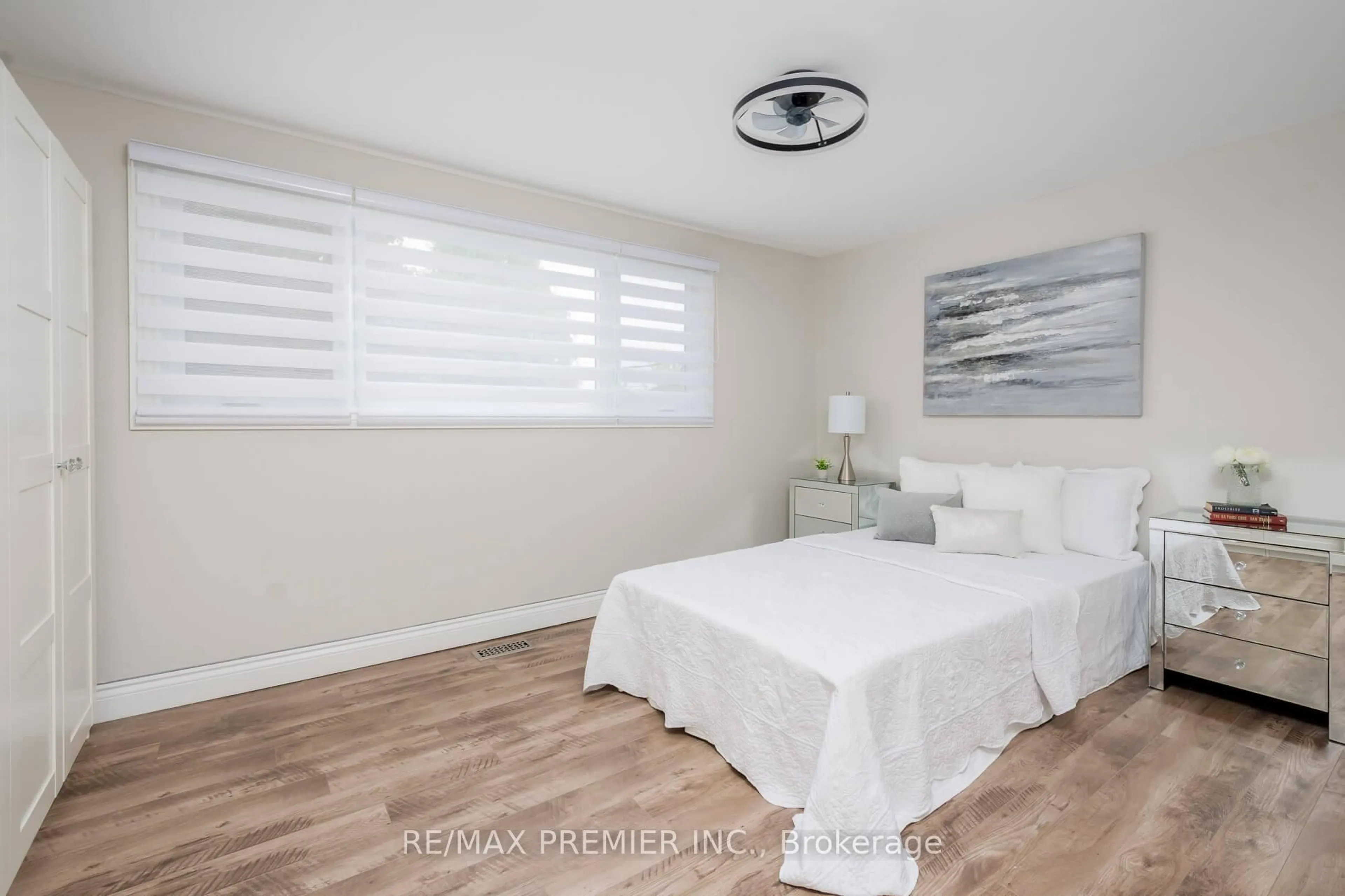 Bedroom with bed, wood/laminate floor for 15 Maple Ave, New Tecumseth Ontario L0G 1A0