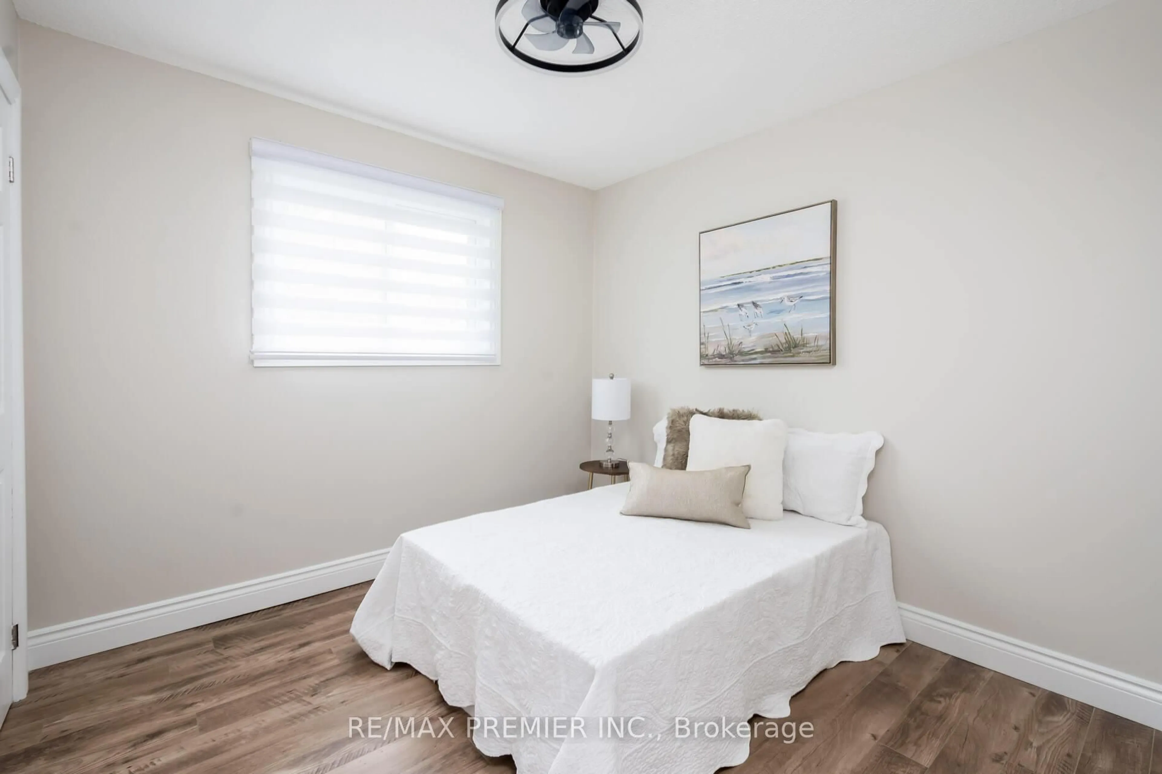 Bedroom with bed, wood/laminate floor for 15 Maple Ave, New Tecumseth Ontario L0G 1A0