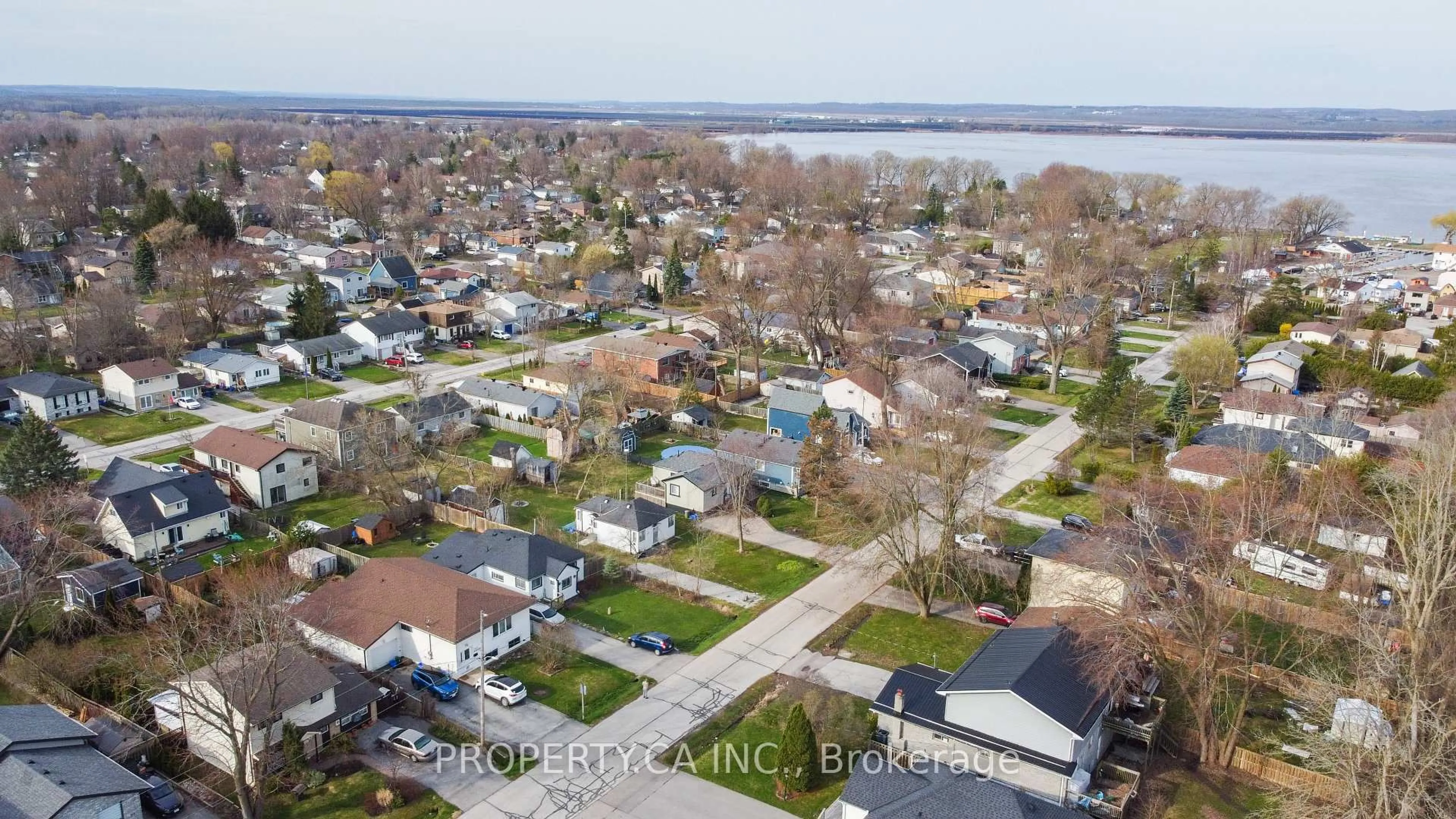 A pic from outside/outdoor area/front of a property/back of a property/a pic from drone, water/lake/river/ocean view for 323 Pasadena Dr, Georgina Ontario L4P 2Z2