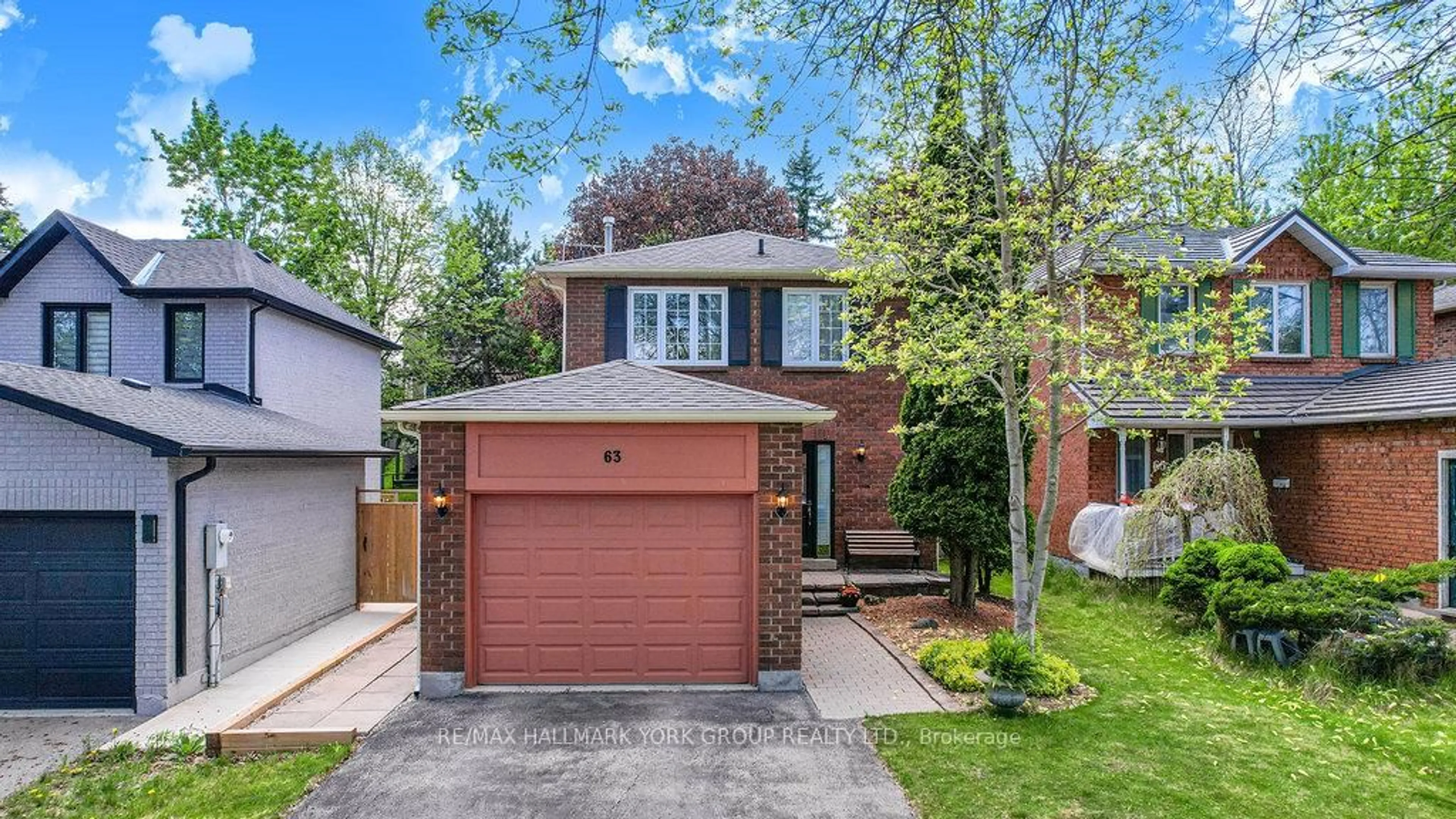 Home with brick exterior material, street for 63 Crawford Rose Dr, Aurora Ontario L4G 4R5