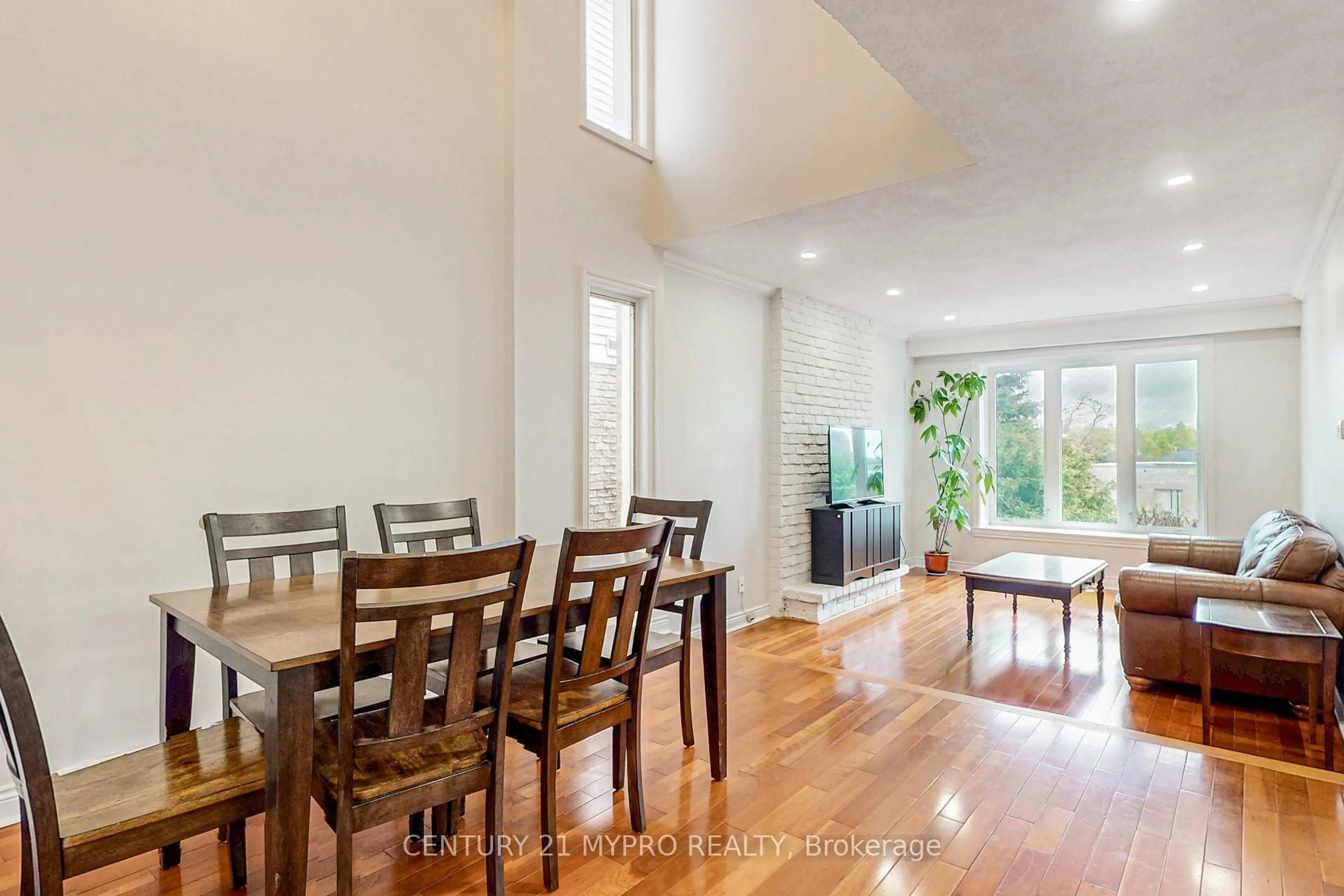 Dining room, wood/laminate floor for 52 Foxglove Crt, Markham Ontario L3R 3Y3