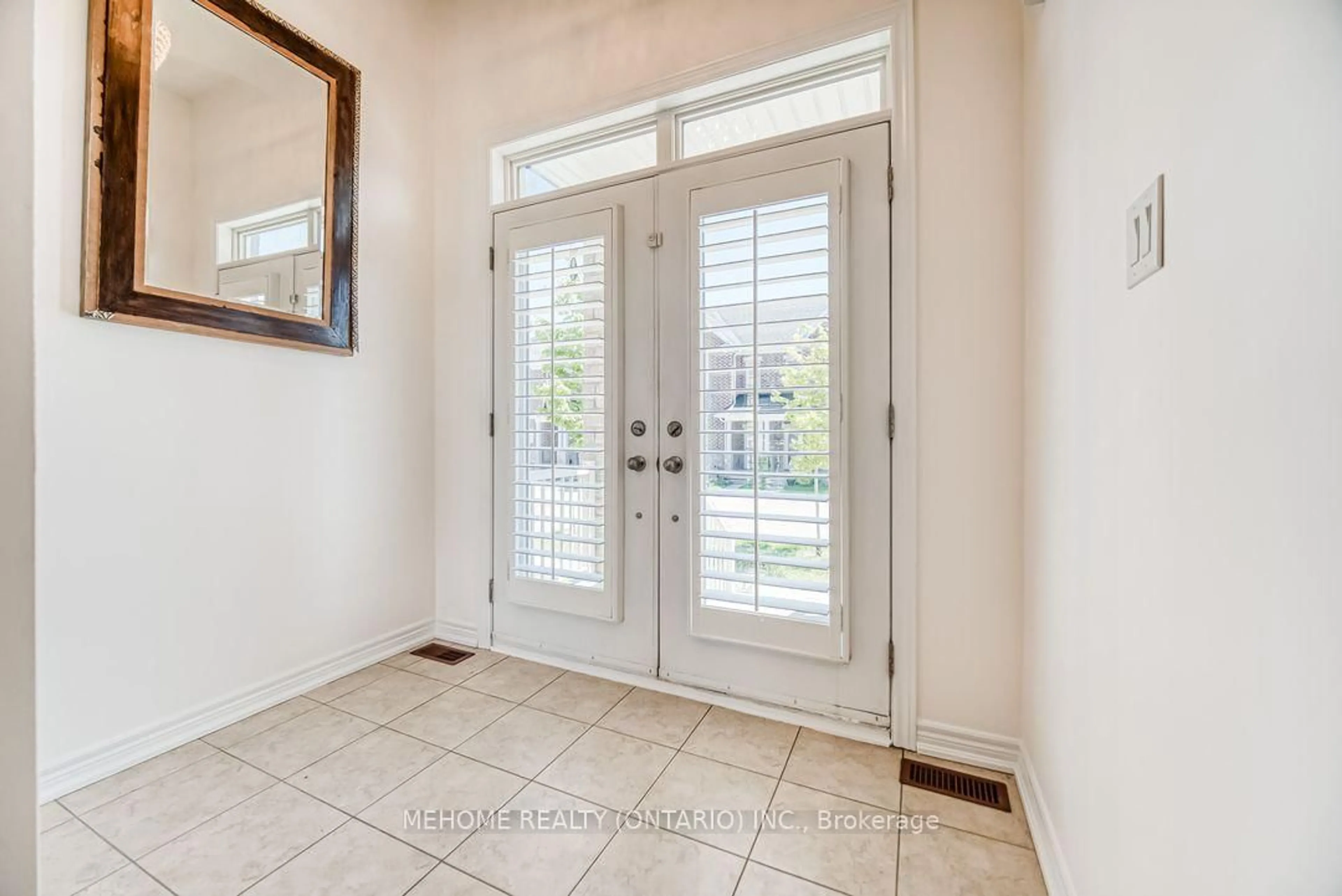Indoor entryway for 100 Ian Baron Ave, Markham Ontario L3R 5S6