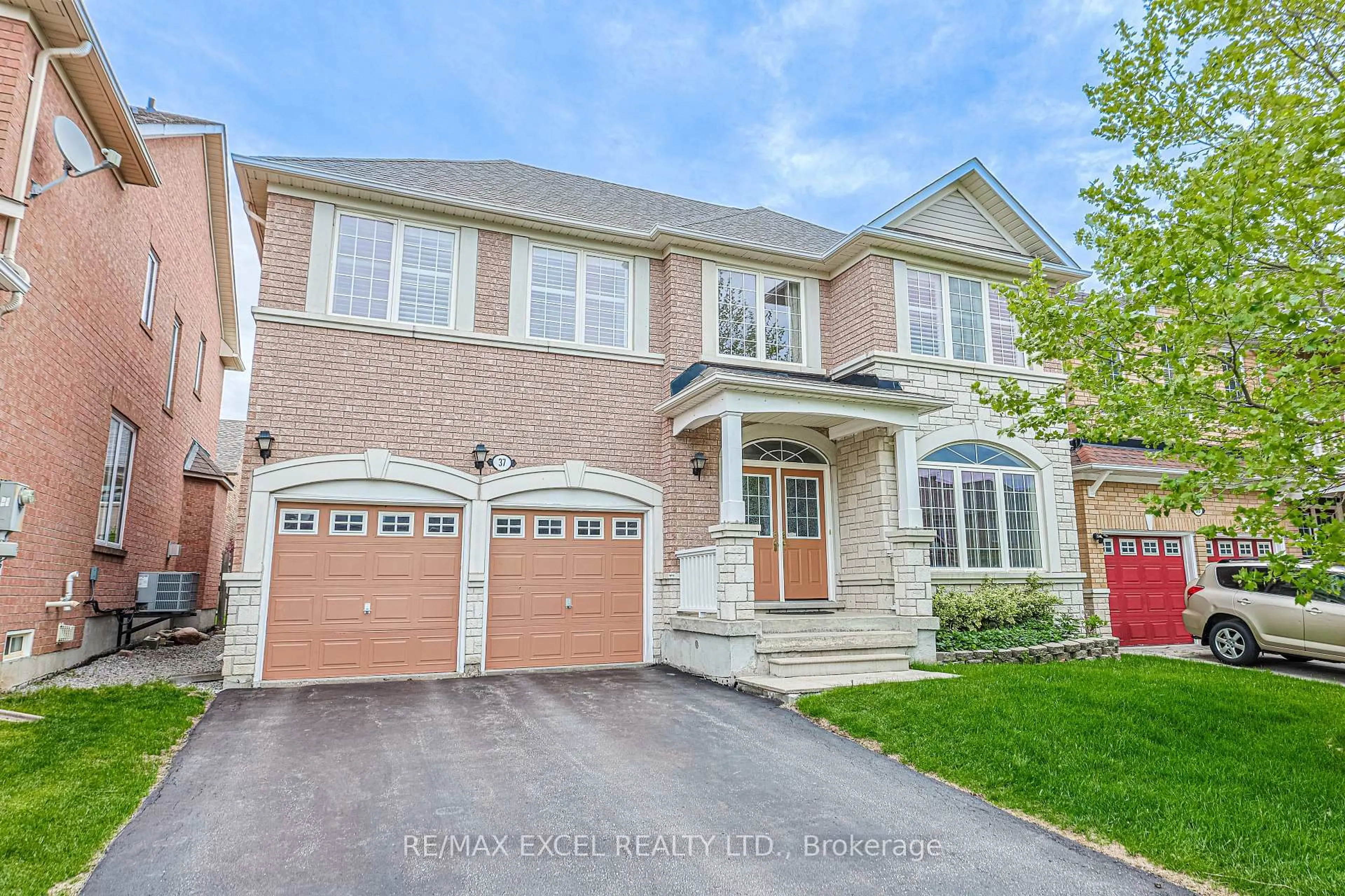 Home with brick exterior material, street for 37 Baintree St, Markham Ontario L6E 1G5