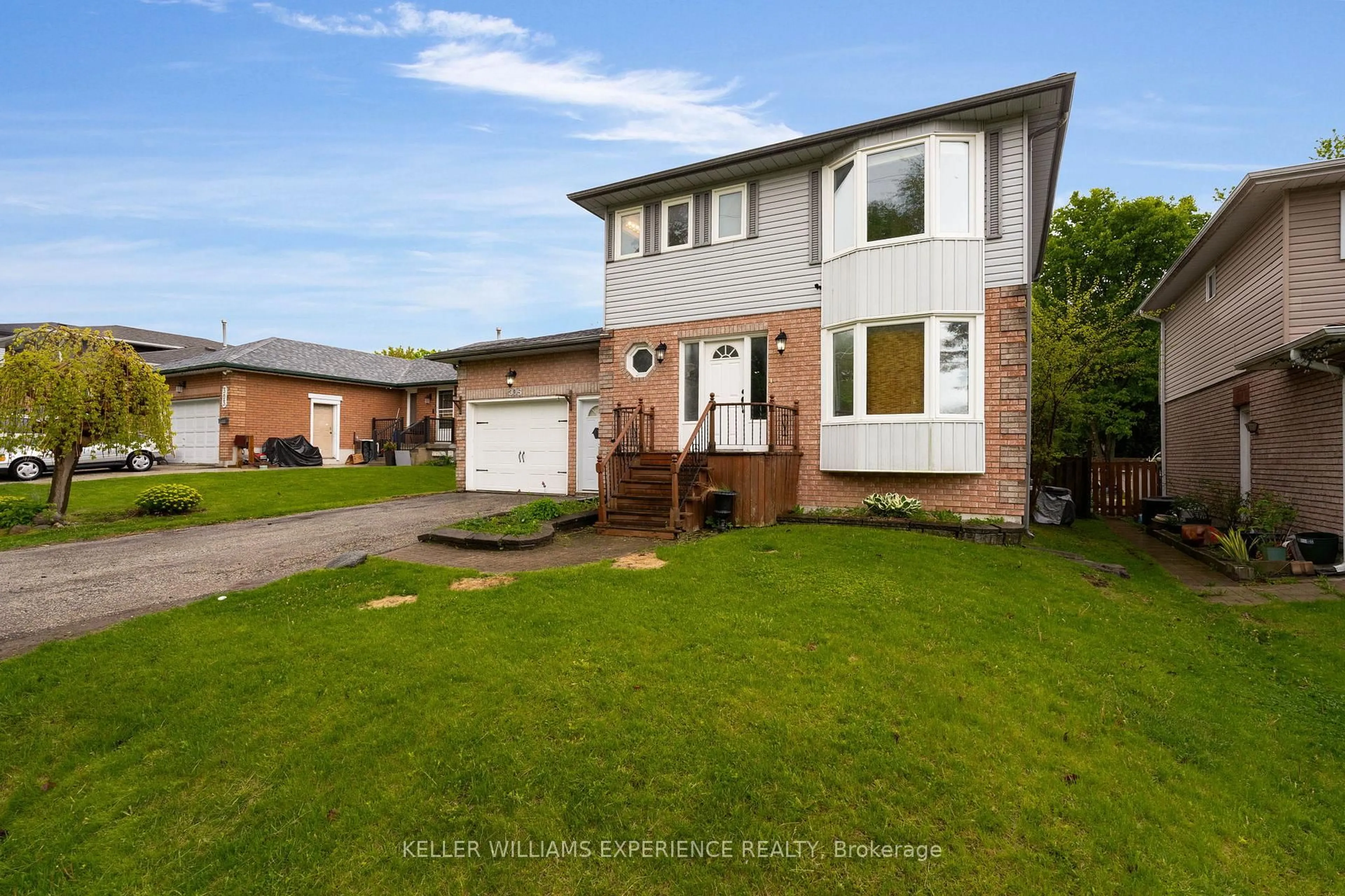 Home with brick exterior material, street for 305 Hollywood Dr, Georgina Ontario L4P 2Z9