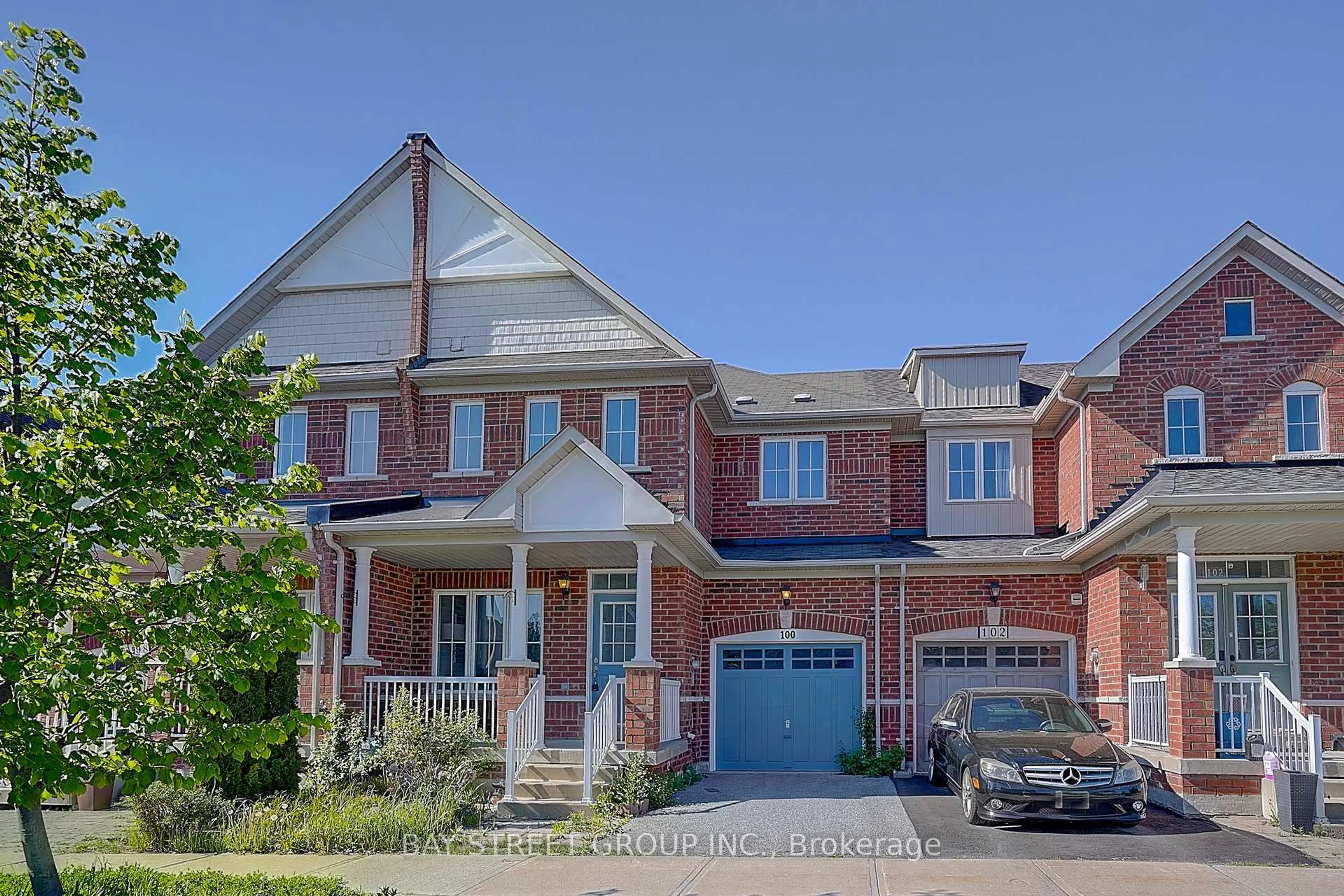 Home with brick exterior material, street for 100 Dovetail Dr, Richmond Hill Ontario L4E 5A7