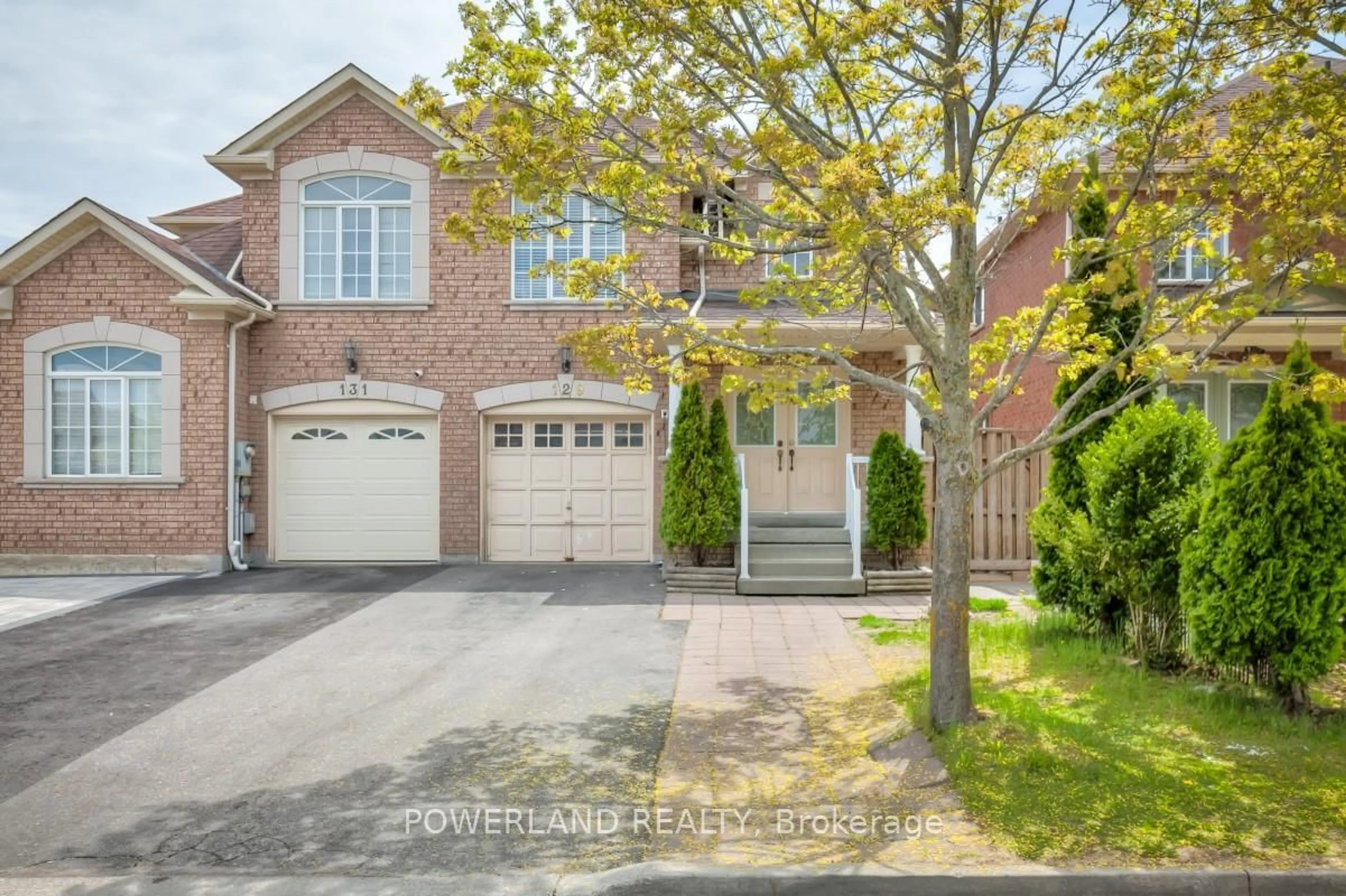 Home with brick exterior material, street for 129 Zio Carlo Dr, Markham Ontario L3R 4X4