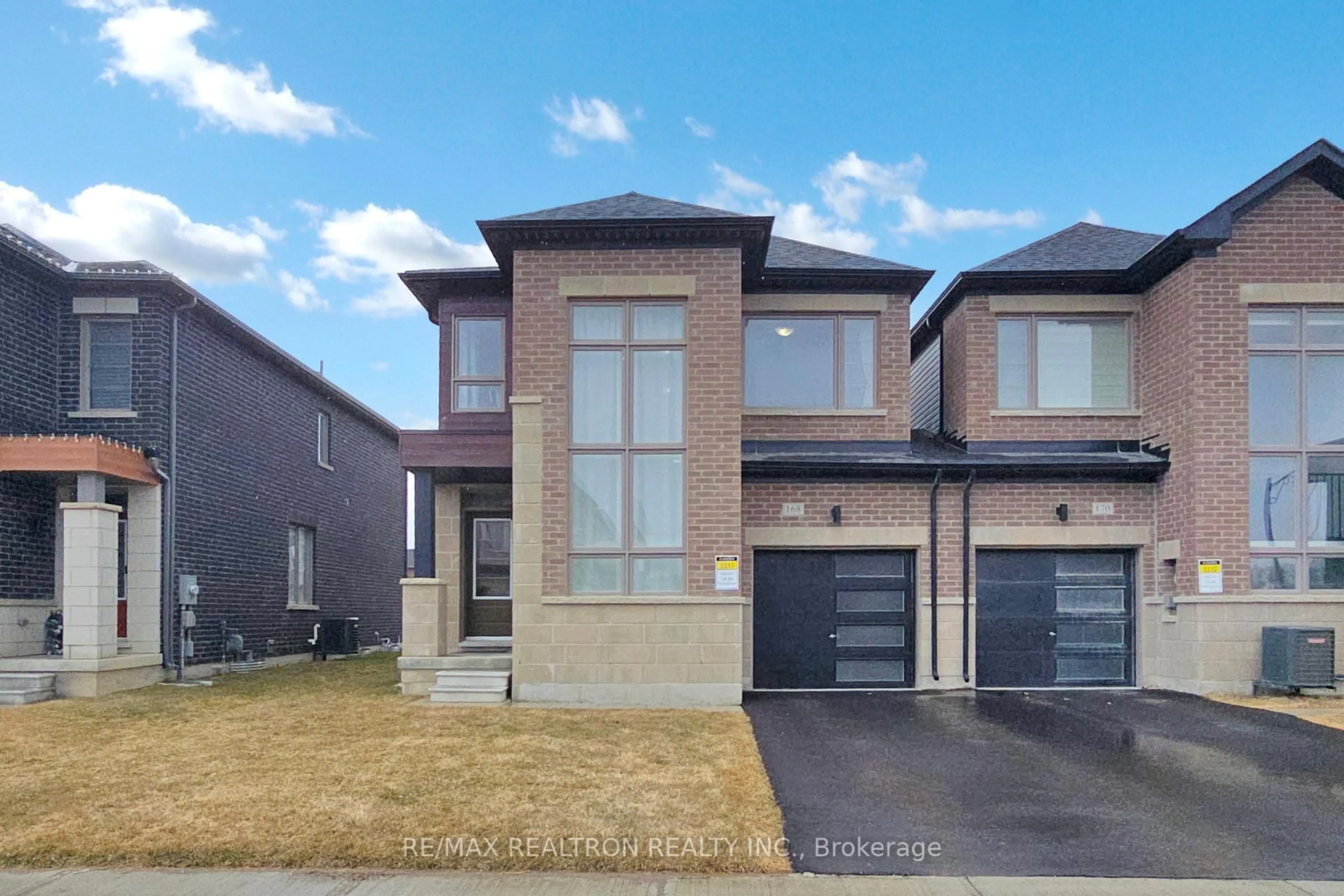 Home with brick exterior material, street for 168 Silk Twist Dr, East Gwillimbury Ontario L9N 0V7