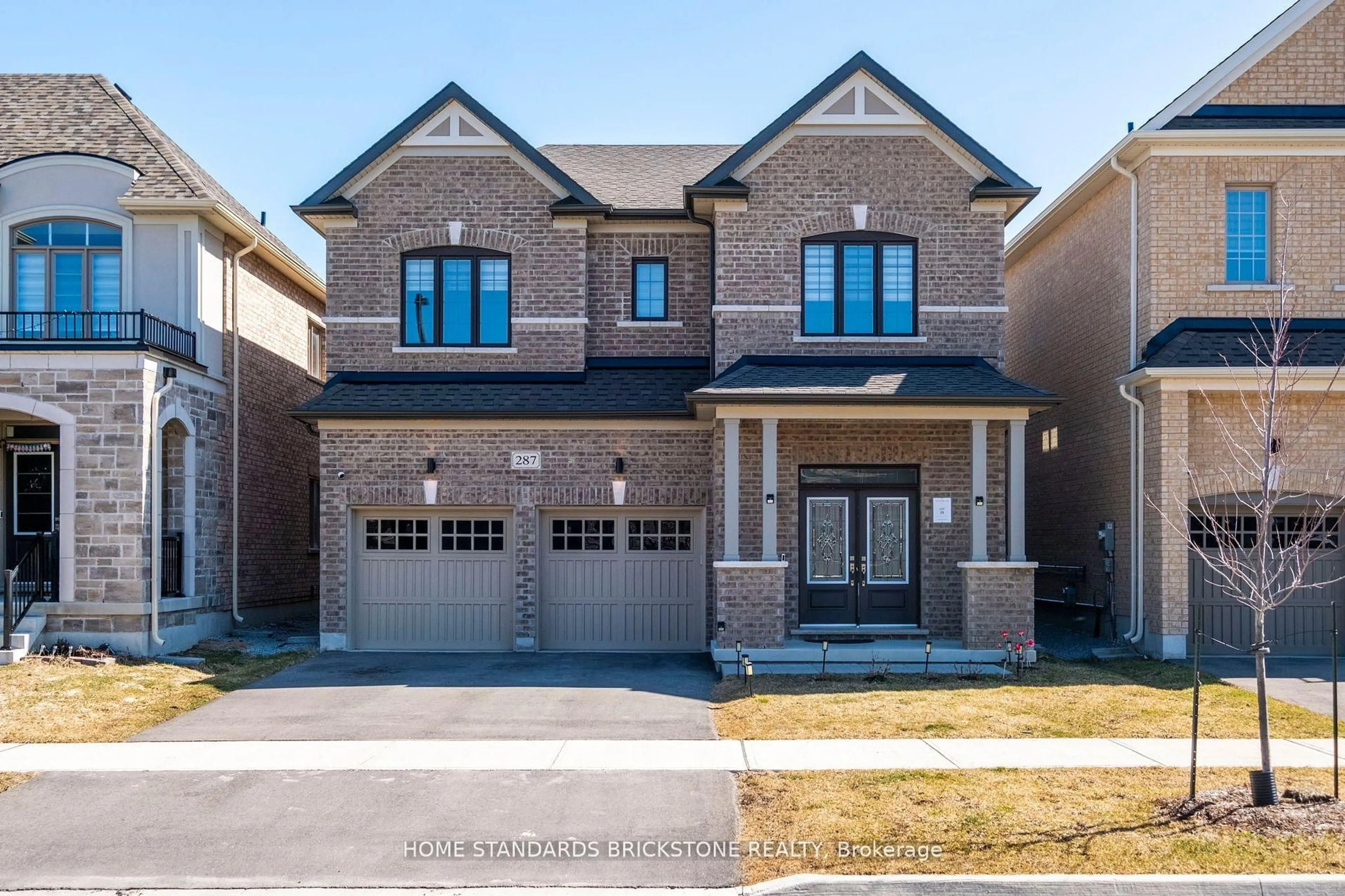 Home with brick exterior material, street for 287 Danny Wheeler Blvd, Georgina Ontario L4P 0J7