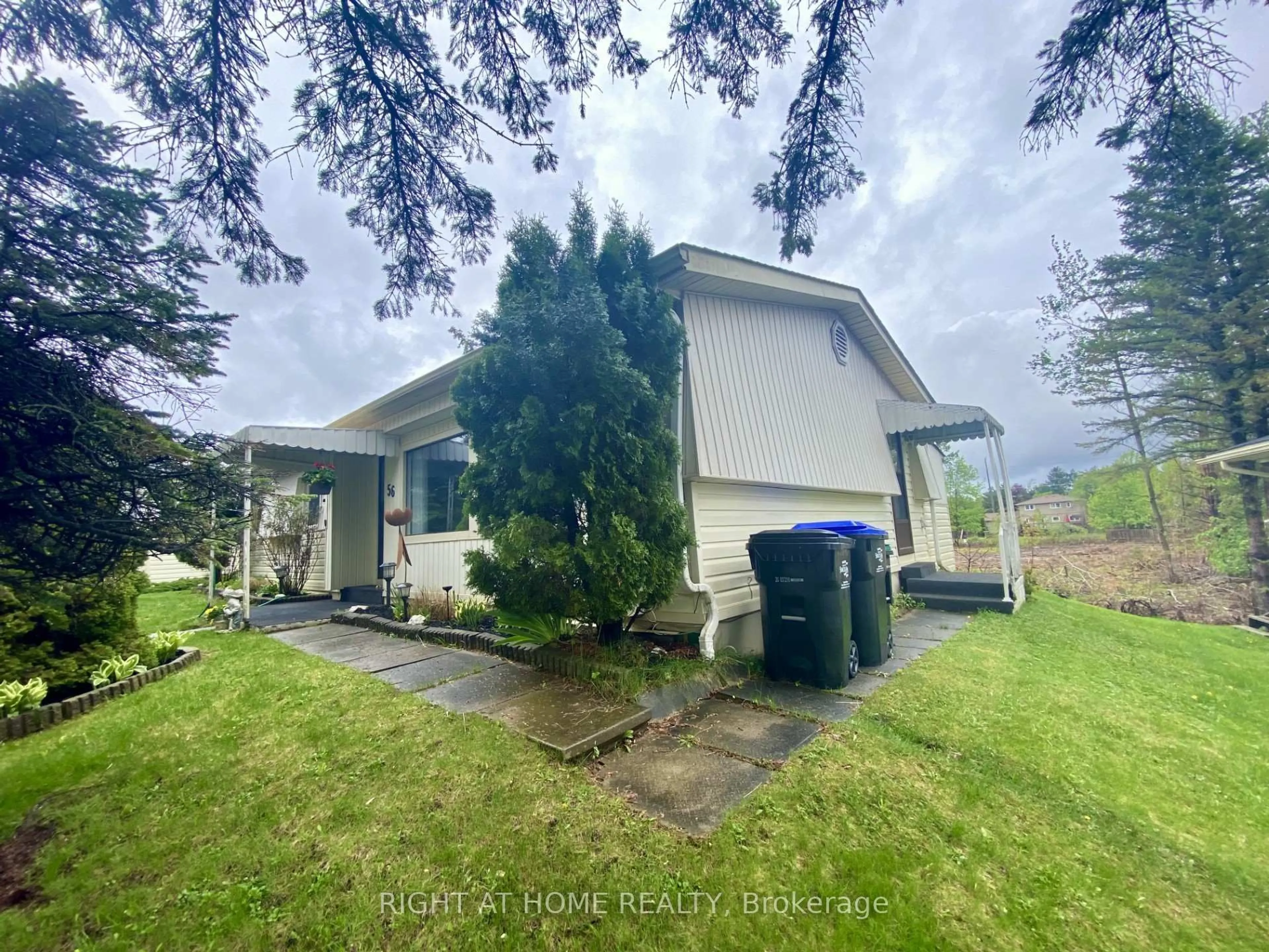 A pic from outside/outdoor area/front of a property/back of a property/a pic from drone, water/lake/river/ocean view for 56 Flora Dr, Innisfil Ontario L9S 1R1