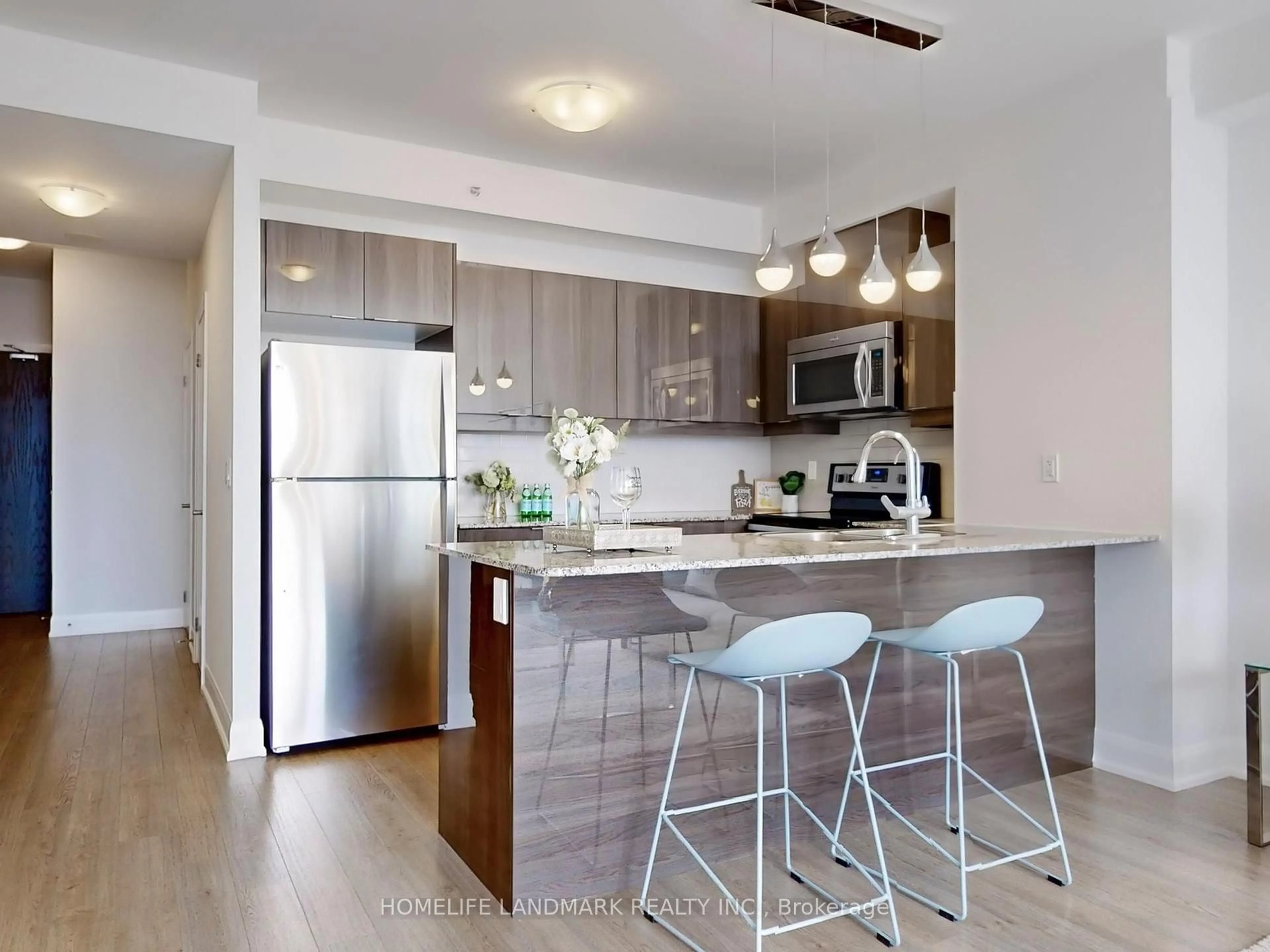 Open concept kitchen, wood/laminate floor for 2910 Highway 7 Rd #1802, Vaughan Ontario L4K 0G3