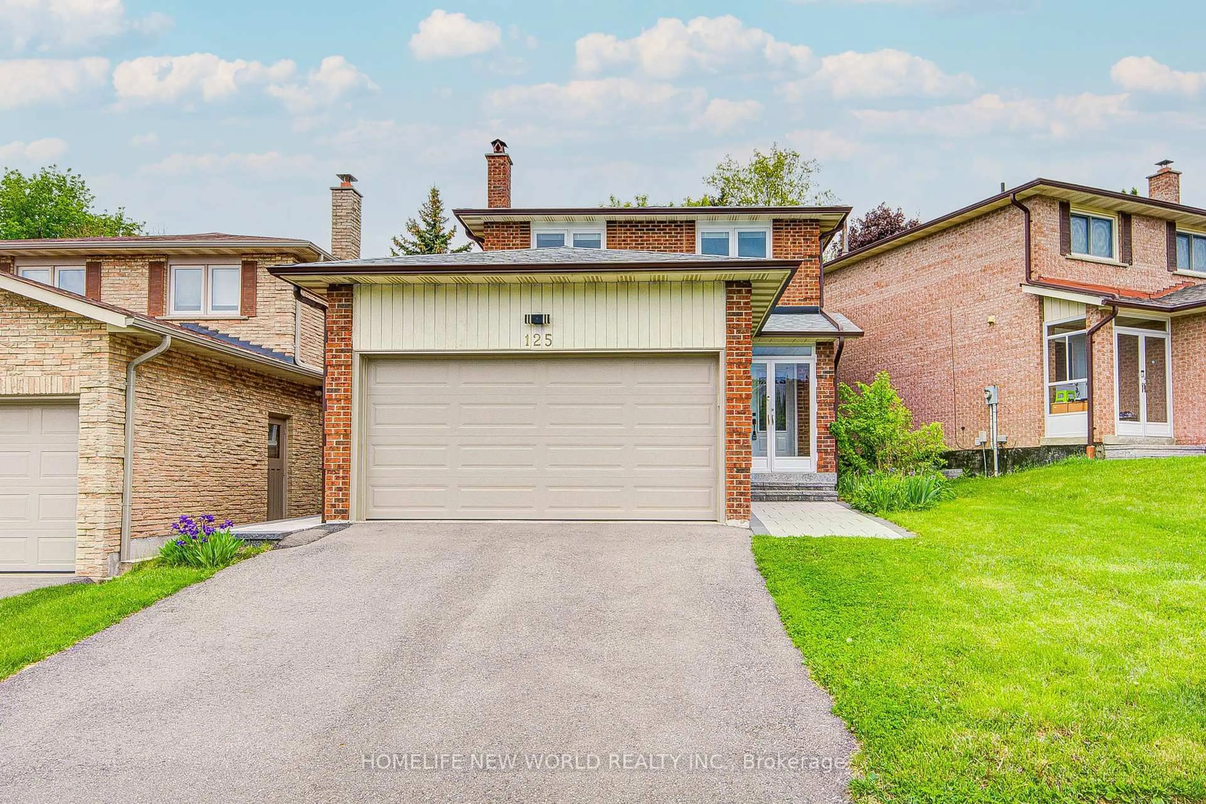 Home with brick exterior material, street for 125 Major Buttons Dr, Markham Ontario L3P 3X7