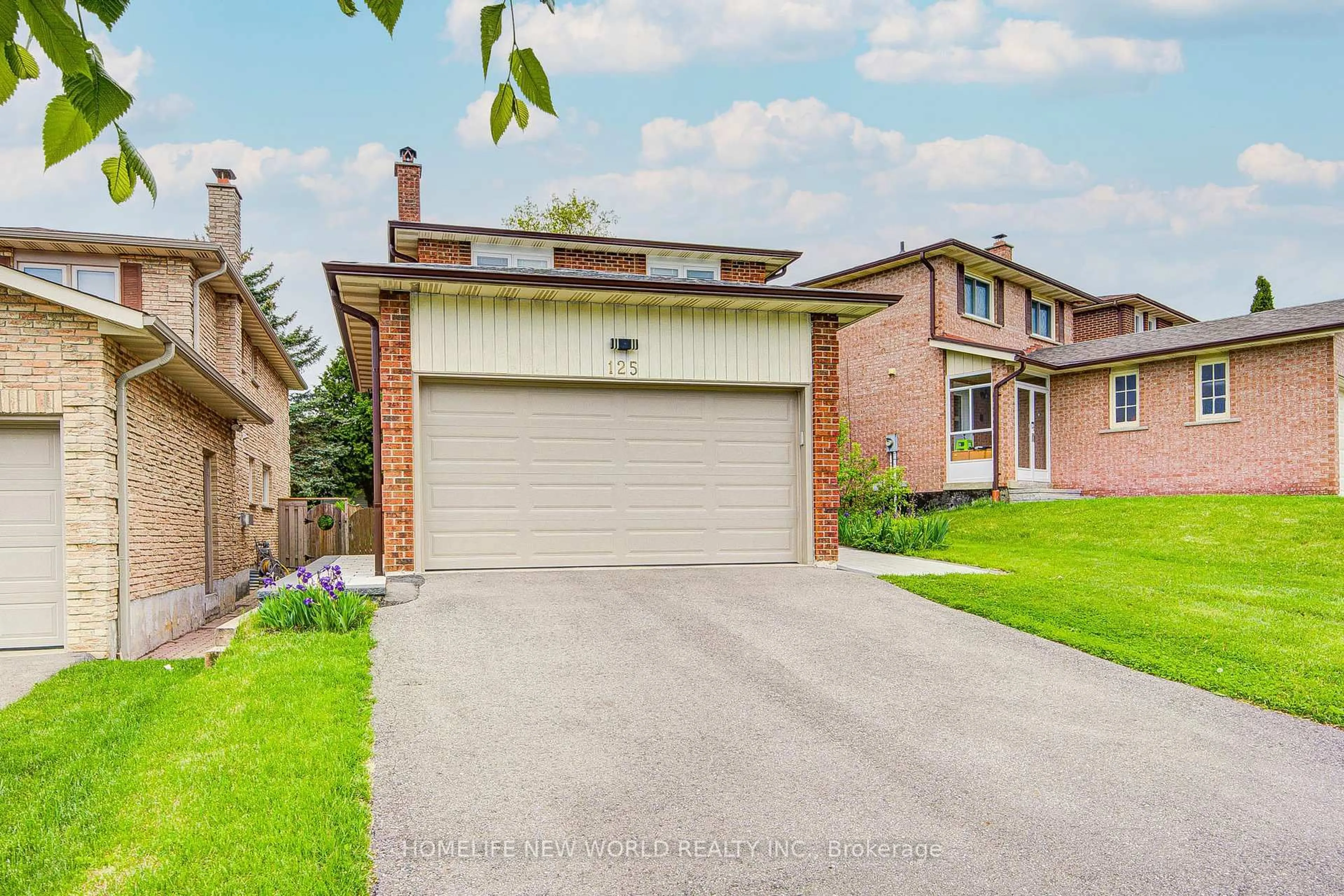 Home with brick exterior material, street for 125 Major Buttons Dr, Markham Ontario L3P 3X7