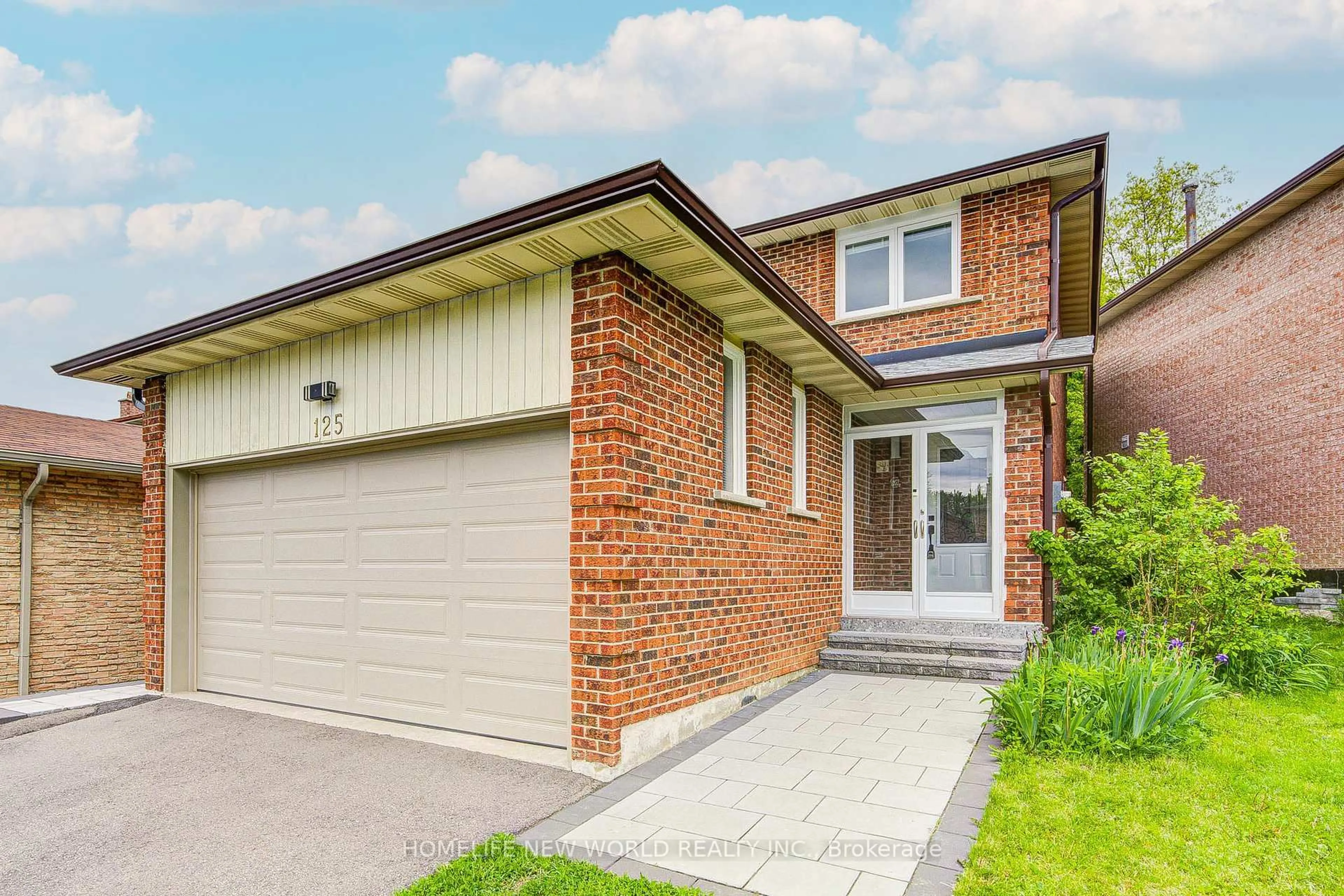 Home with brick exterior material, street for 125 Major Buttons Dr, Markham Ontario L3P 3X7