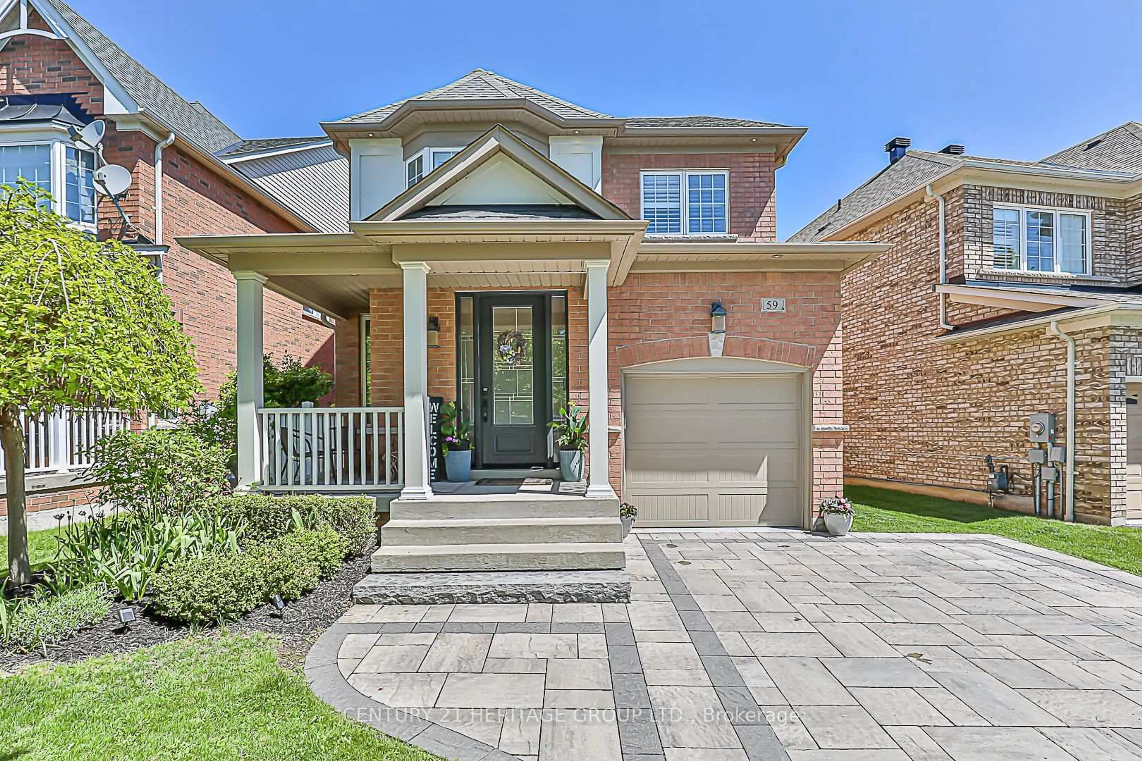 Home with brick exterior material, street for 59 Amos Lehman Way, Whitchurch-Stouffville Ontario L4A 0L3