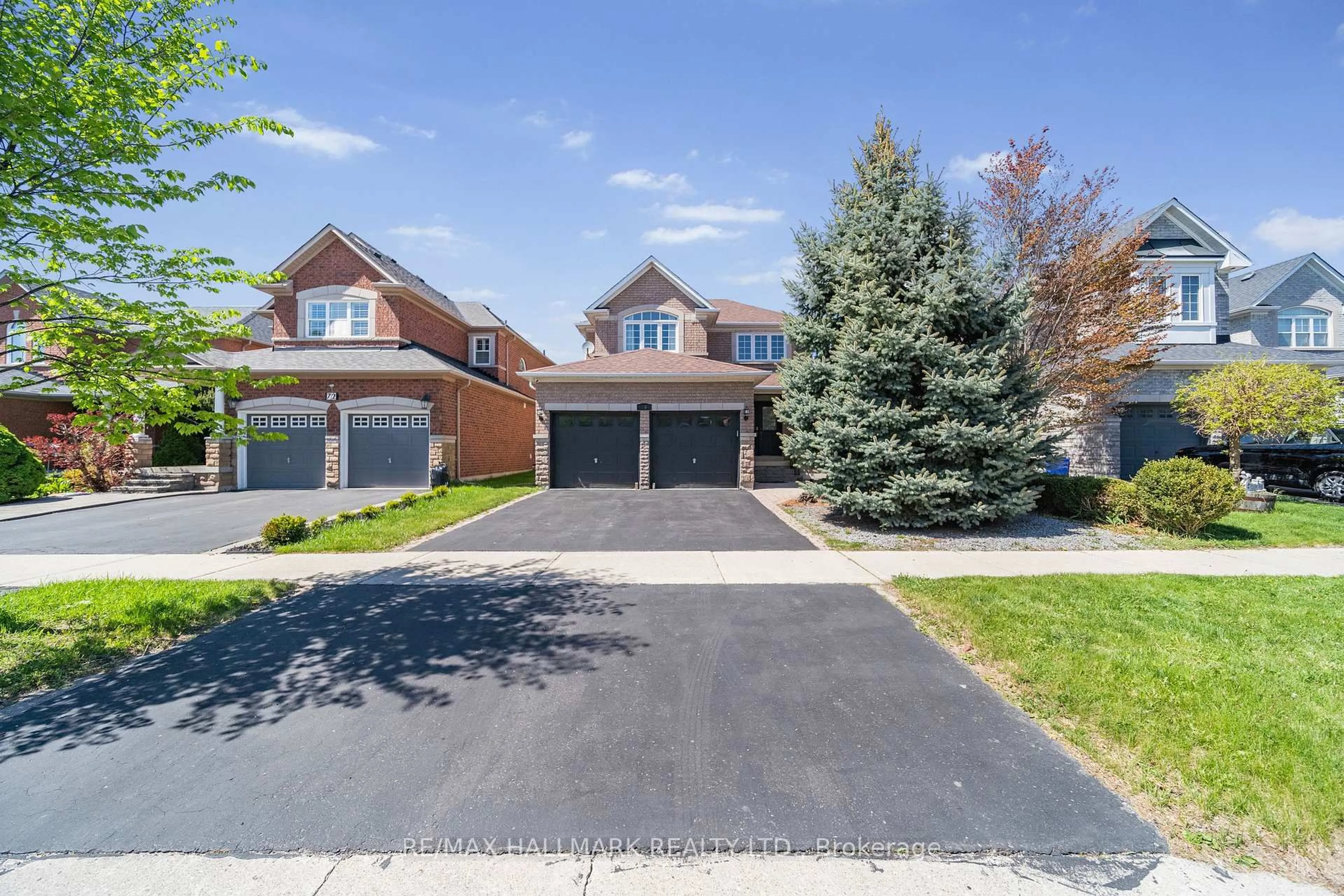 Home with brick exterior material, street for 70 Deerwood Cres, Richmond Hill Ontario L4E 4B4