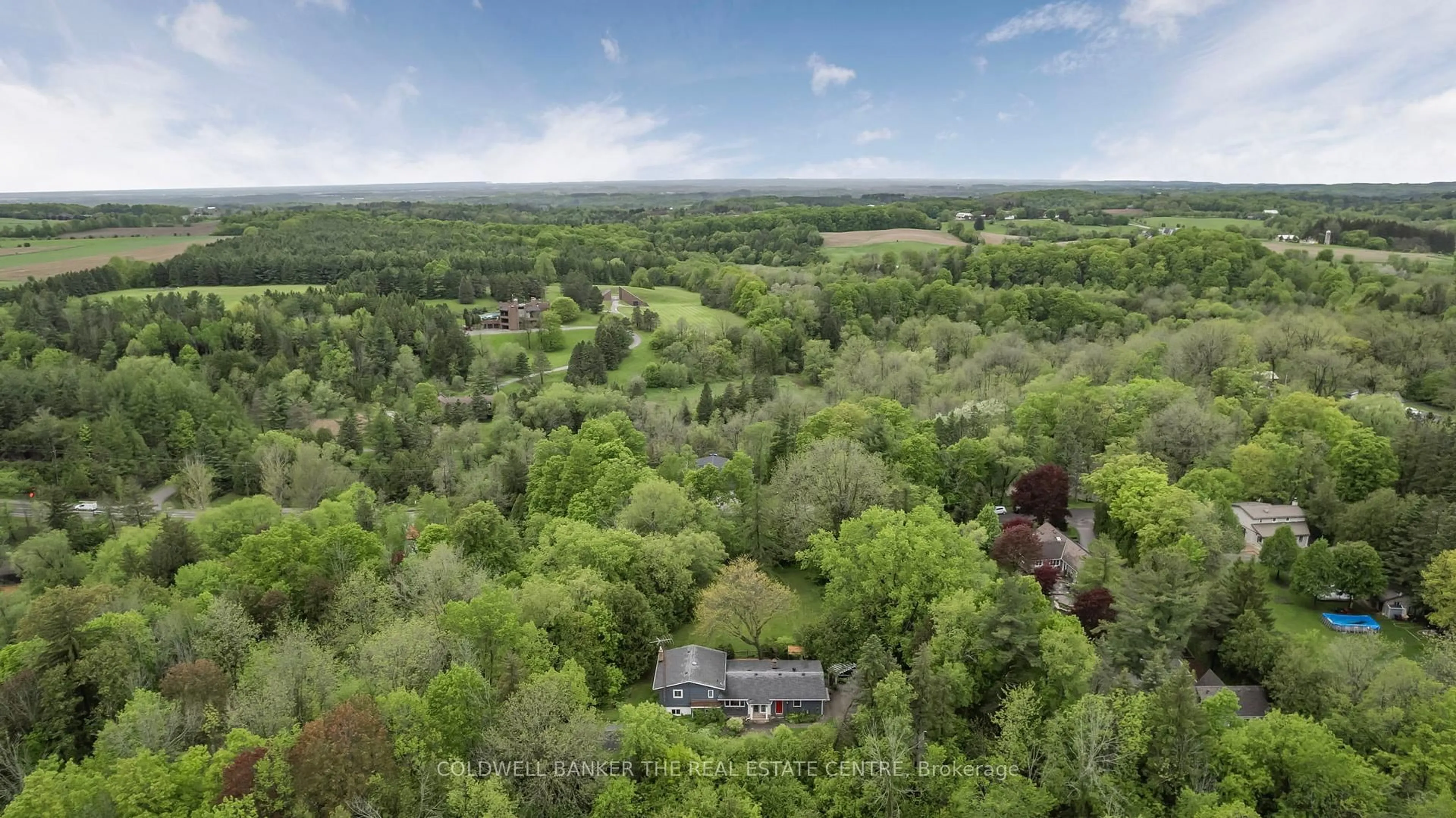 A pic from outside/outdoor area/front of a property/back of a property/a pic from drone, forest/trees view for 55 Old Church Rd, King Ontario L7B 1K4