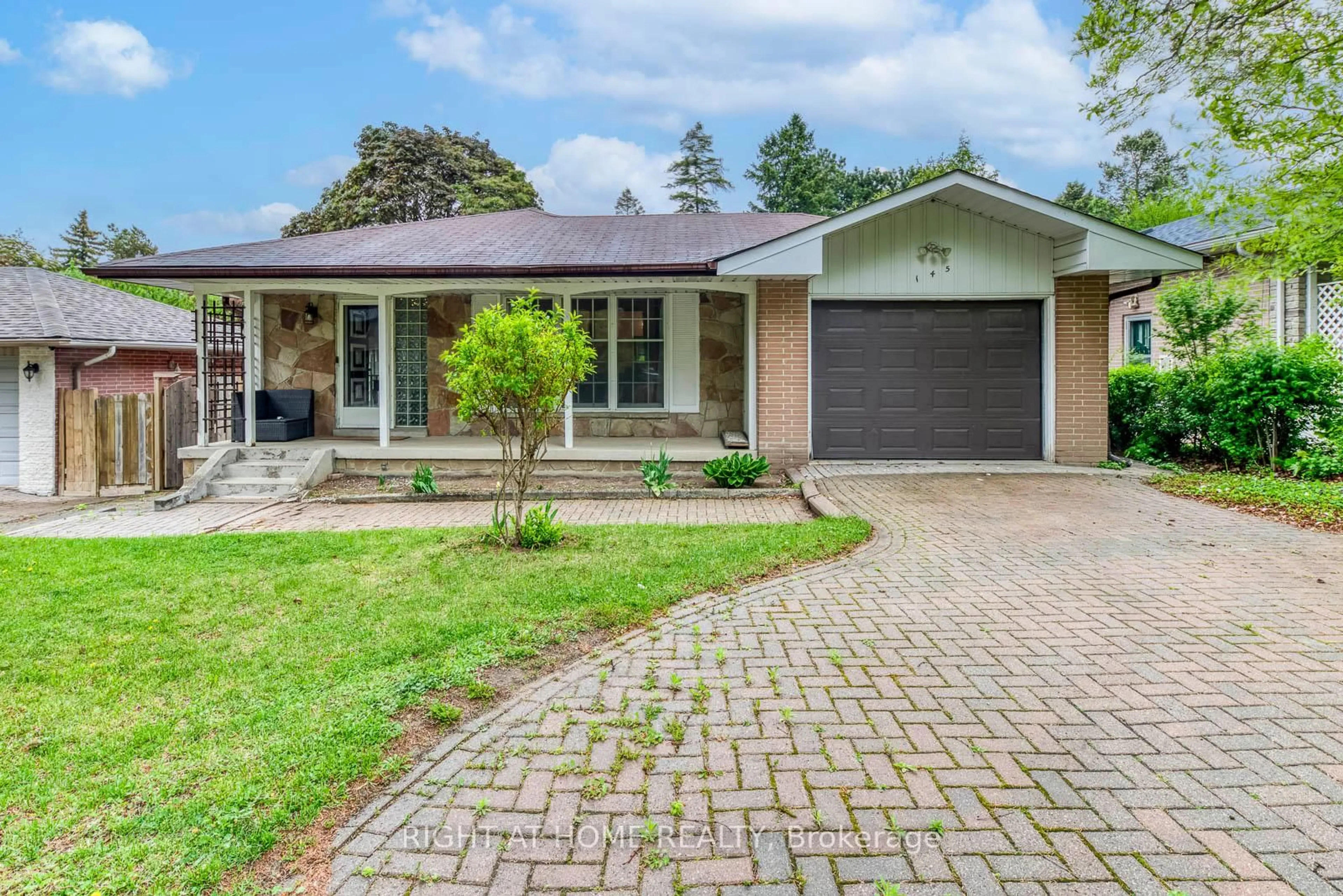 Home with brick exterior material, street for 145 Highland Park Blvd, Markham Ontario L3T 1B8