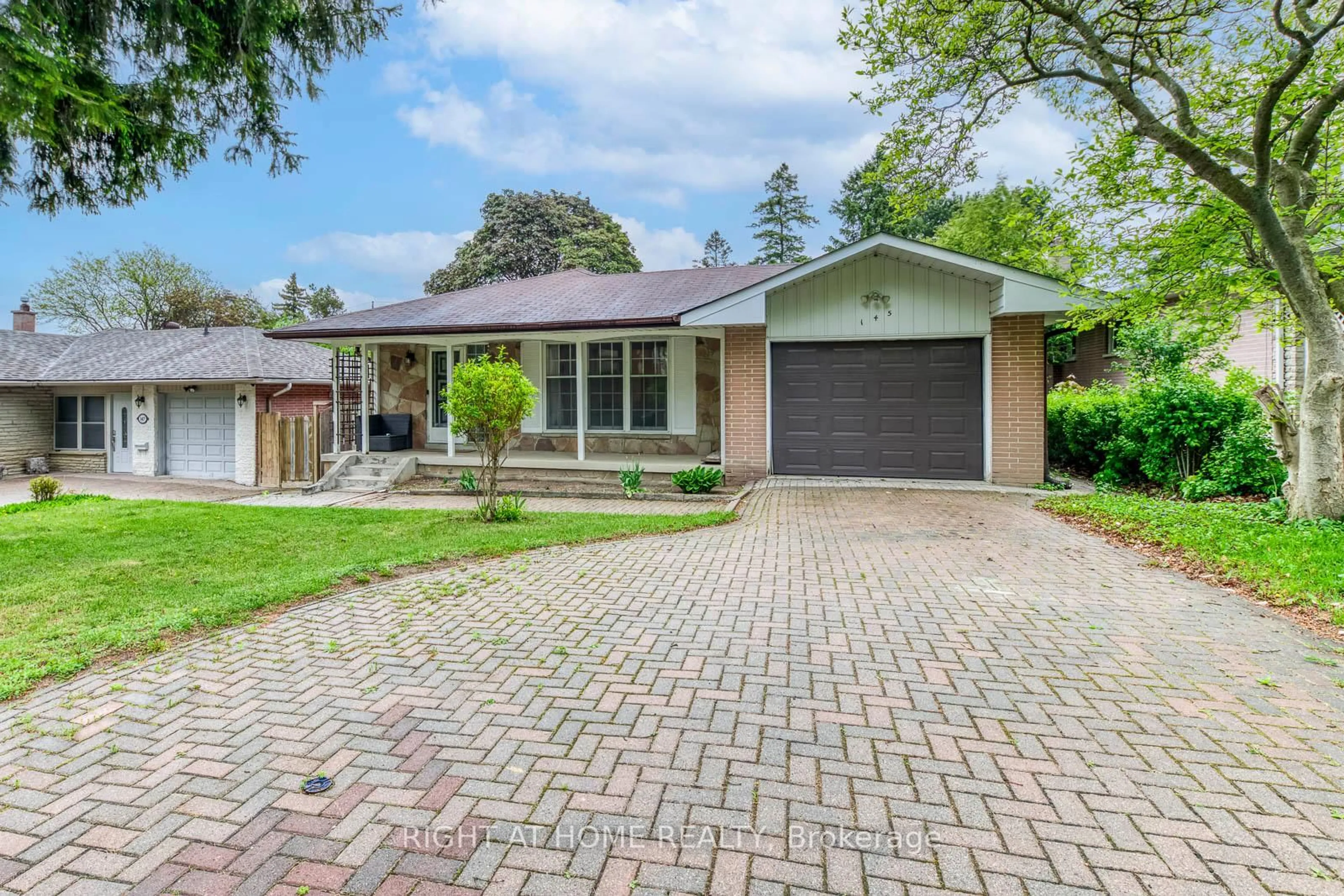 Home with brick exterior material, street for 145 Highland Park Blvd, Markham Ontario L3T 1B8