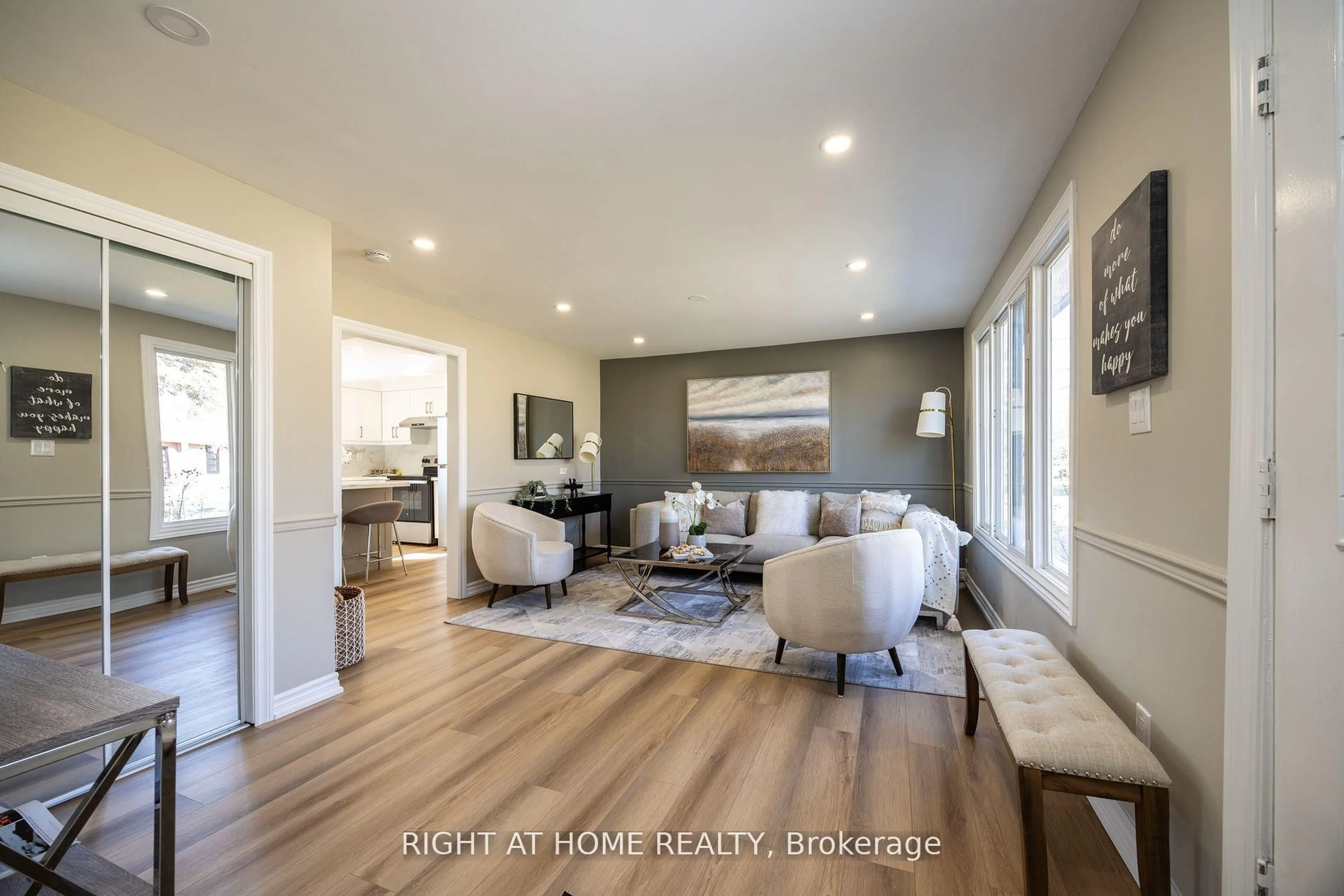 Living room with furniture, wood/laminate floor for 15 Farr Ave, East Gwillimbury Ontario L0G 1V0