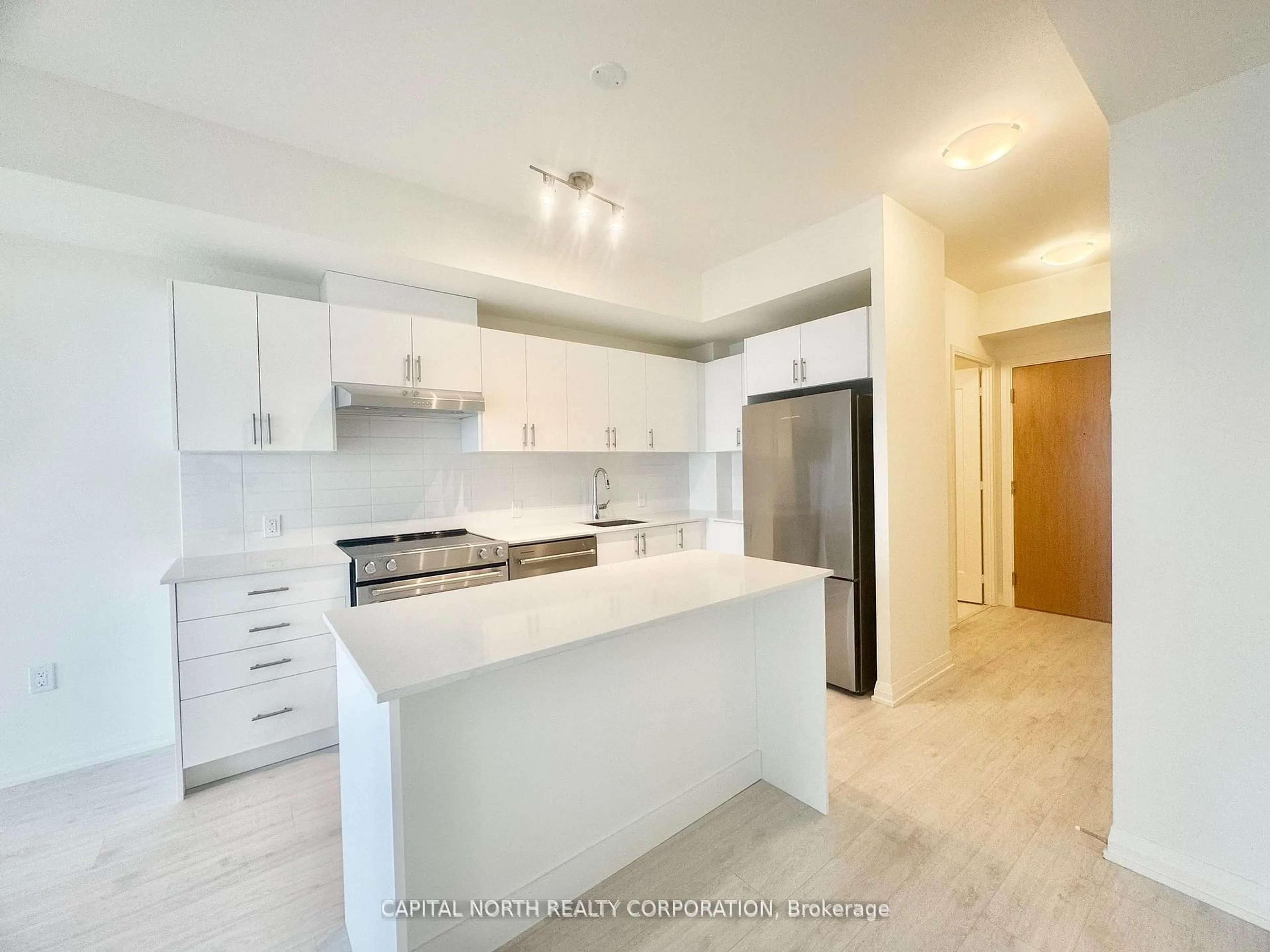 Open concept kitchen, ceramic/tile floor for 8960 Jane St #2306, Vaughan Ontario L4K 2M9