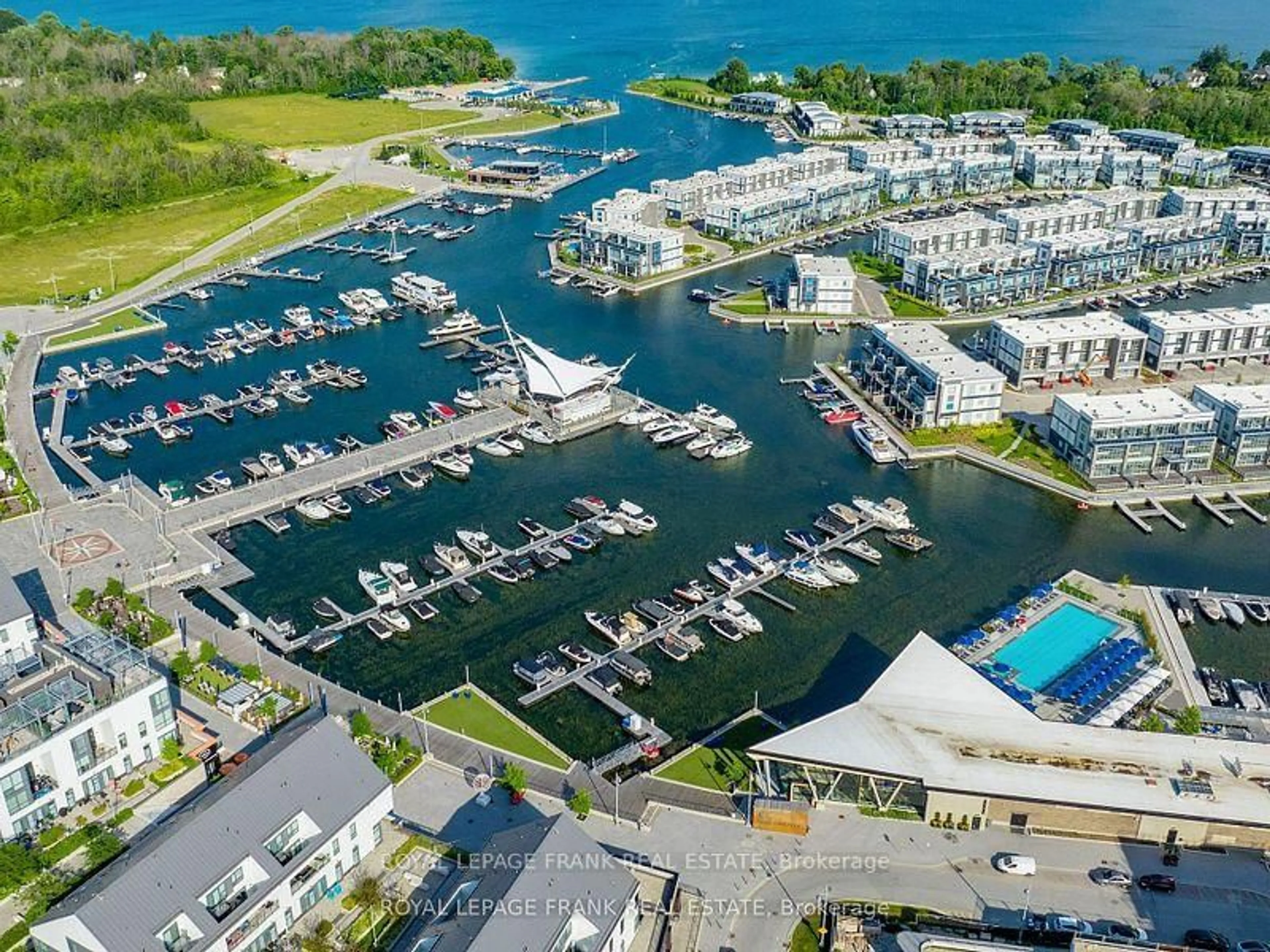 A pic from outside/outdoor area/front of a property/back of a property/a pic from drone, water/lake/river/ocean view for 333 Sea Ray Ave ##D313, Innisfil Ontario L9S 2P7