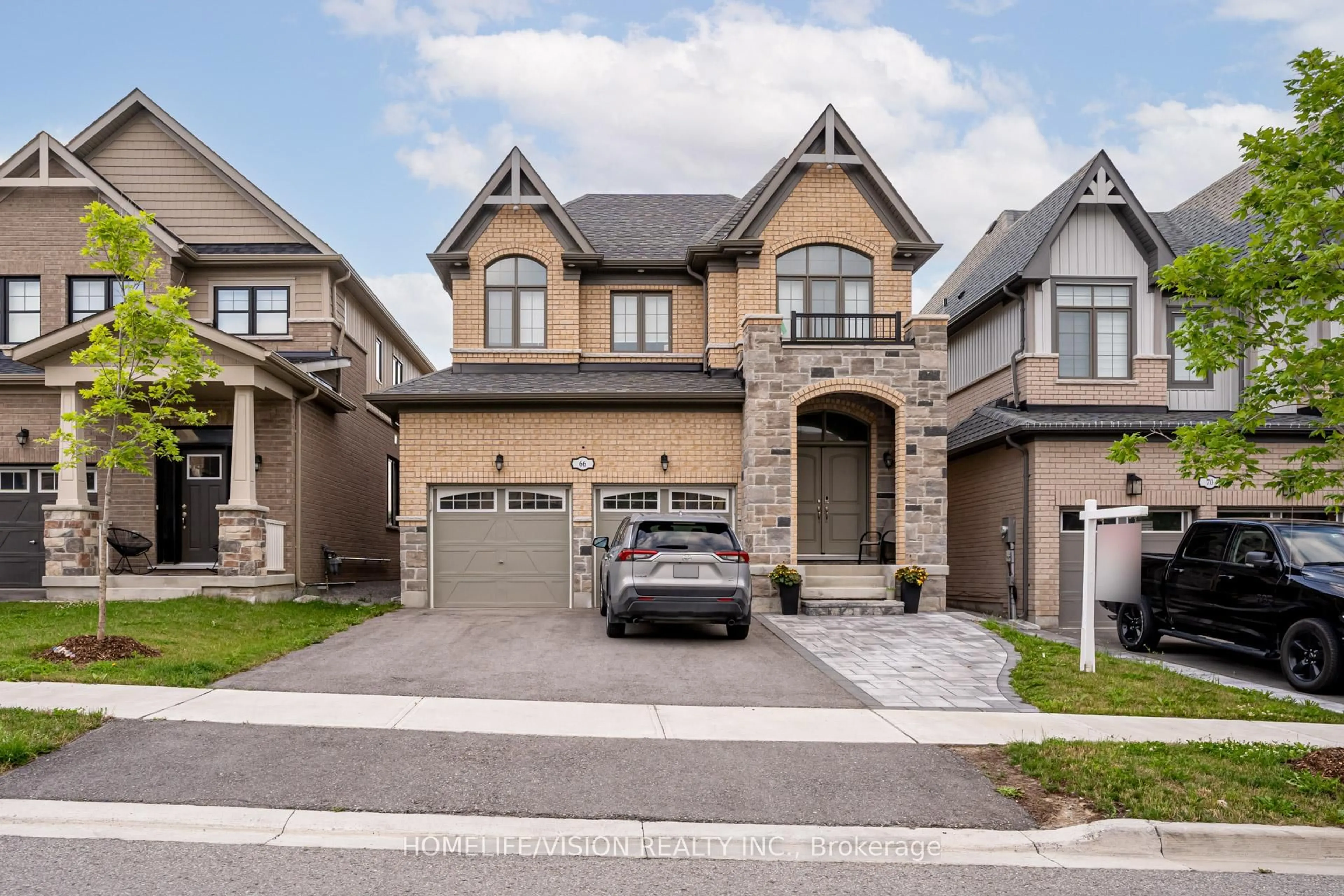 Home with brick exterior material, street for 66 Chessington Ave, East Gwillimbury Ontario L9N 0R5