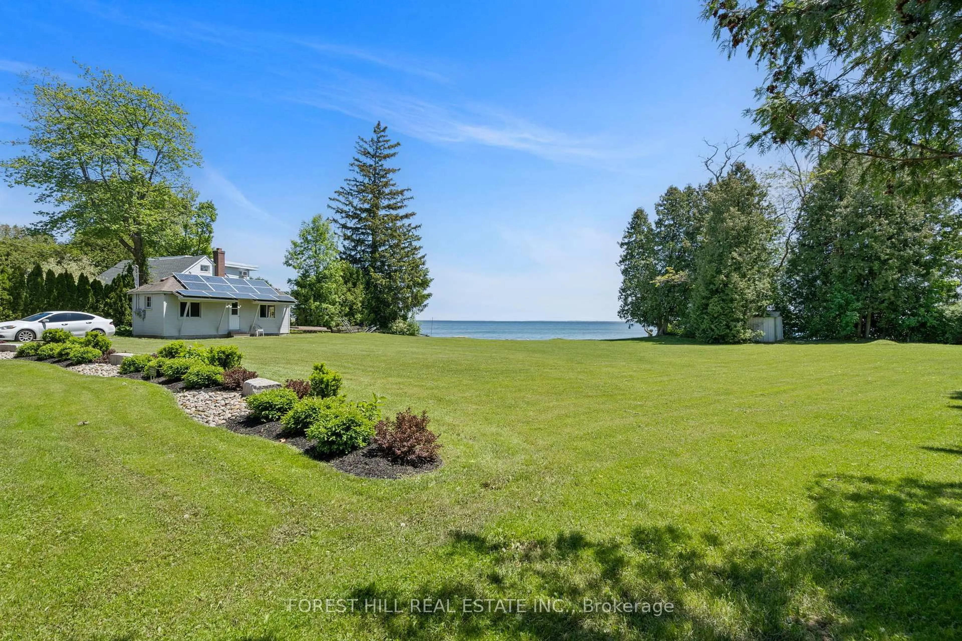 A pic from outside/outdoor area/front of a property/back of a property/a pic from drone, water/lake/river/ocean view for 49 Sunnypoint Dr, Innisfil Ontario L9S 2X4