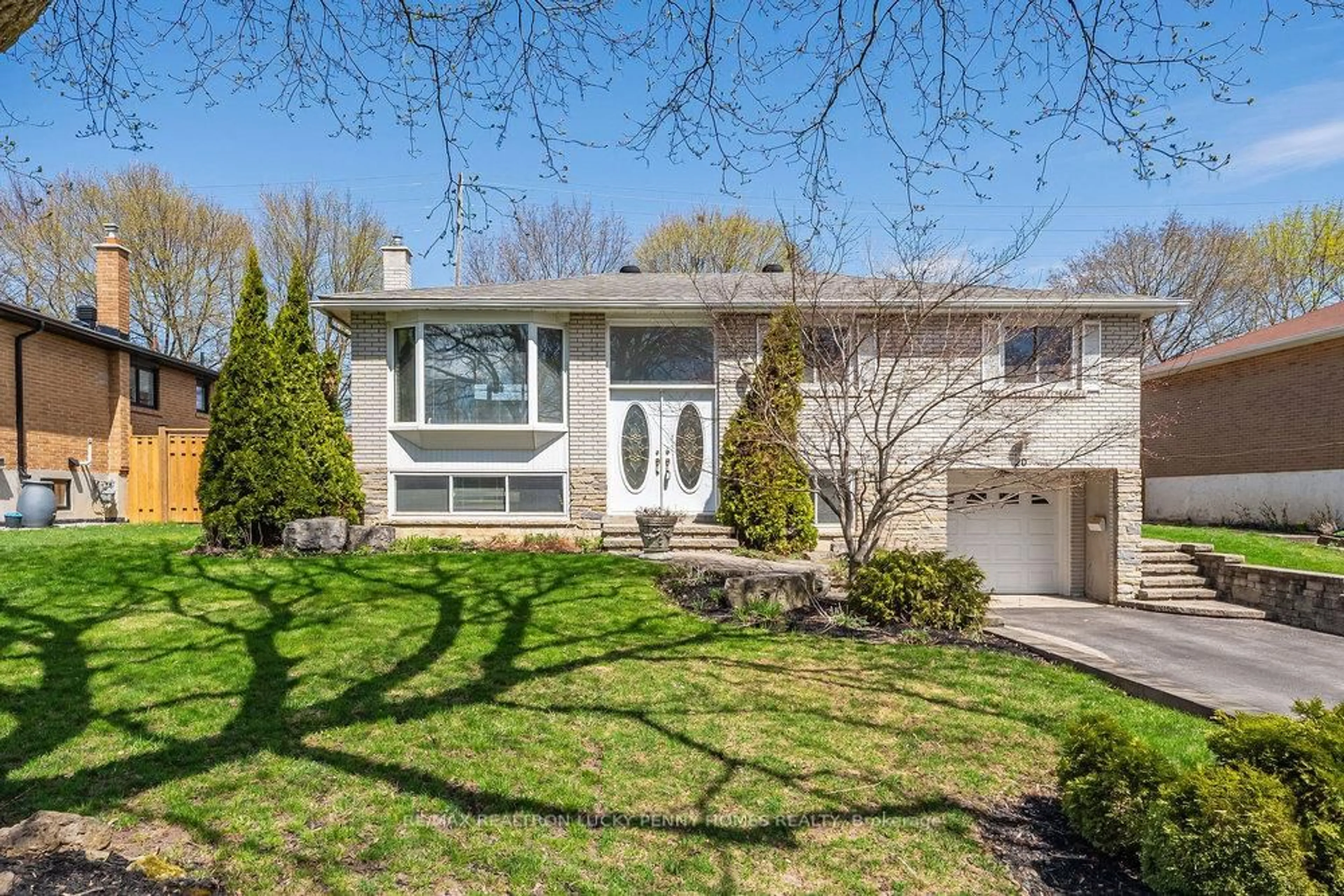 Home with vinyl exterior material, street for 20 Bakerdale Rd, Markham Ontario L3P 1J4