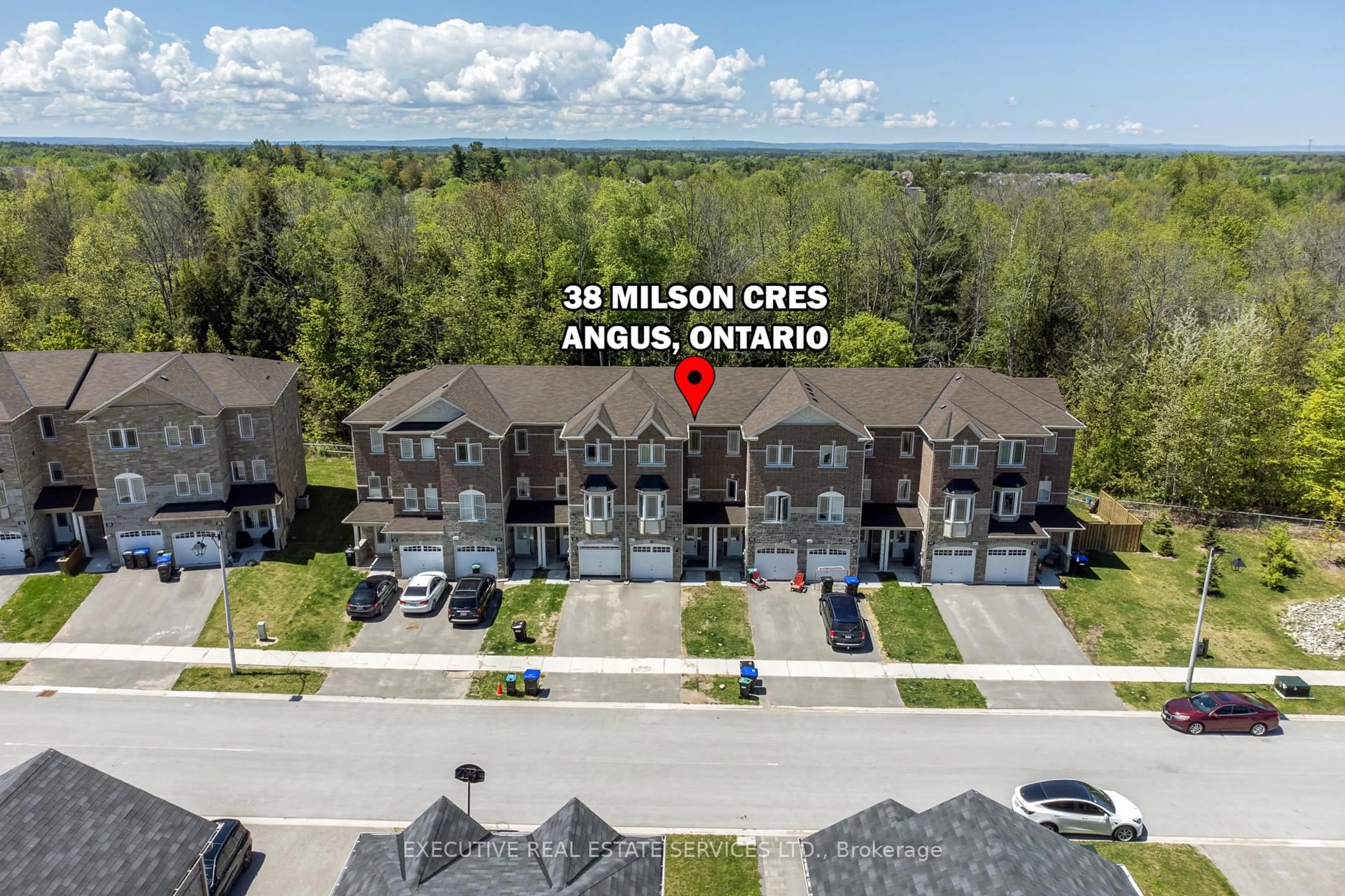 A pic from outside/outdoor area/front of a property/back of a property/a pic from drone, city buildings view from balcony for 38 Milson Cres, Essa Ontario L0M 1B5