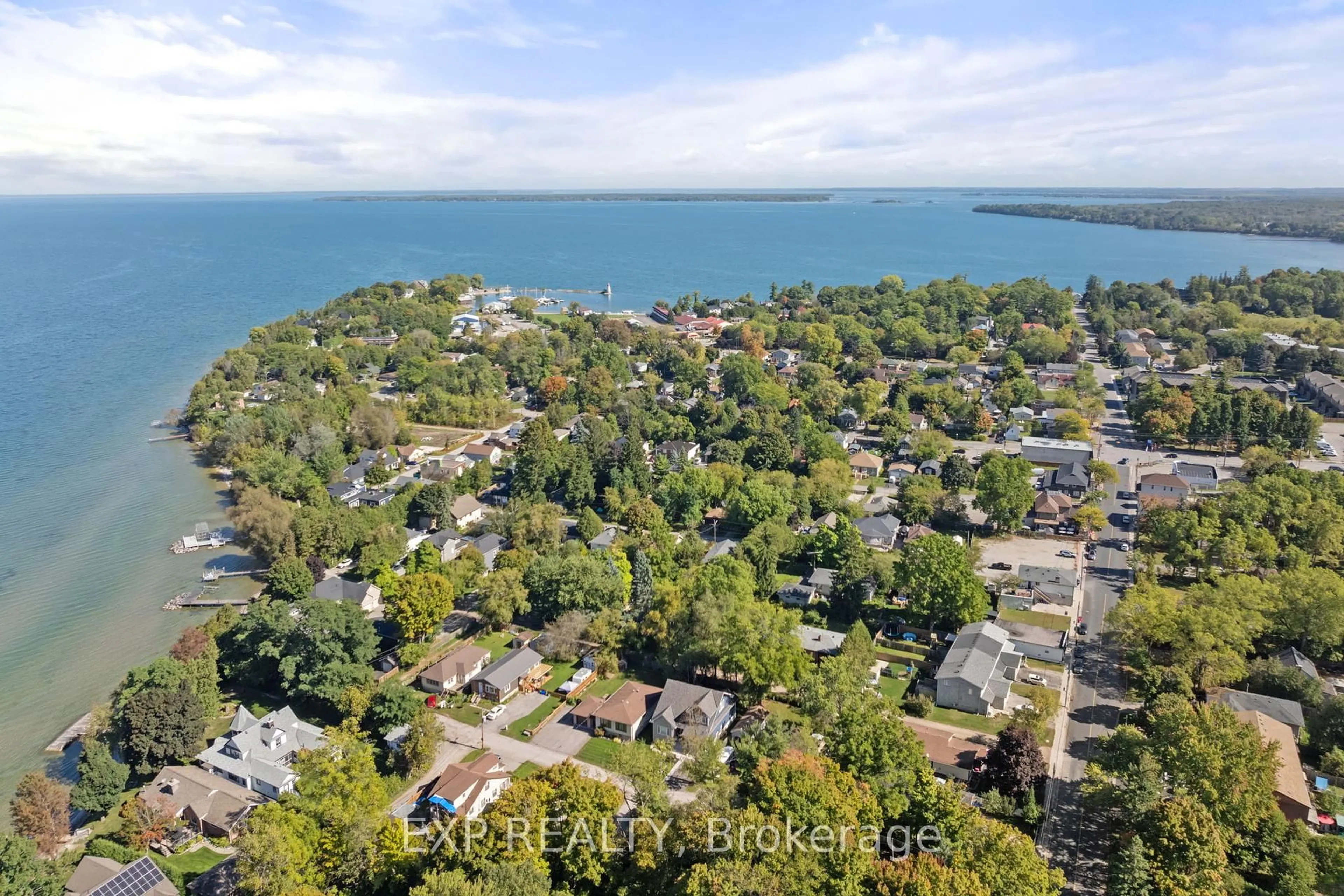 A pic from outside/outdoor area/front of a property/back of a property/a pic from drone, water/lake/river/ocean view for 9 Riley Ave, Georgina Ontario L0E 1L0