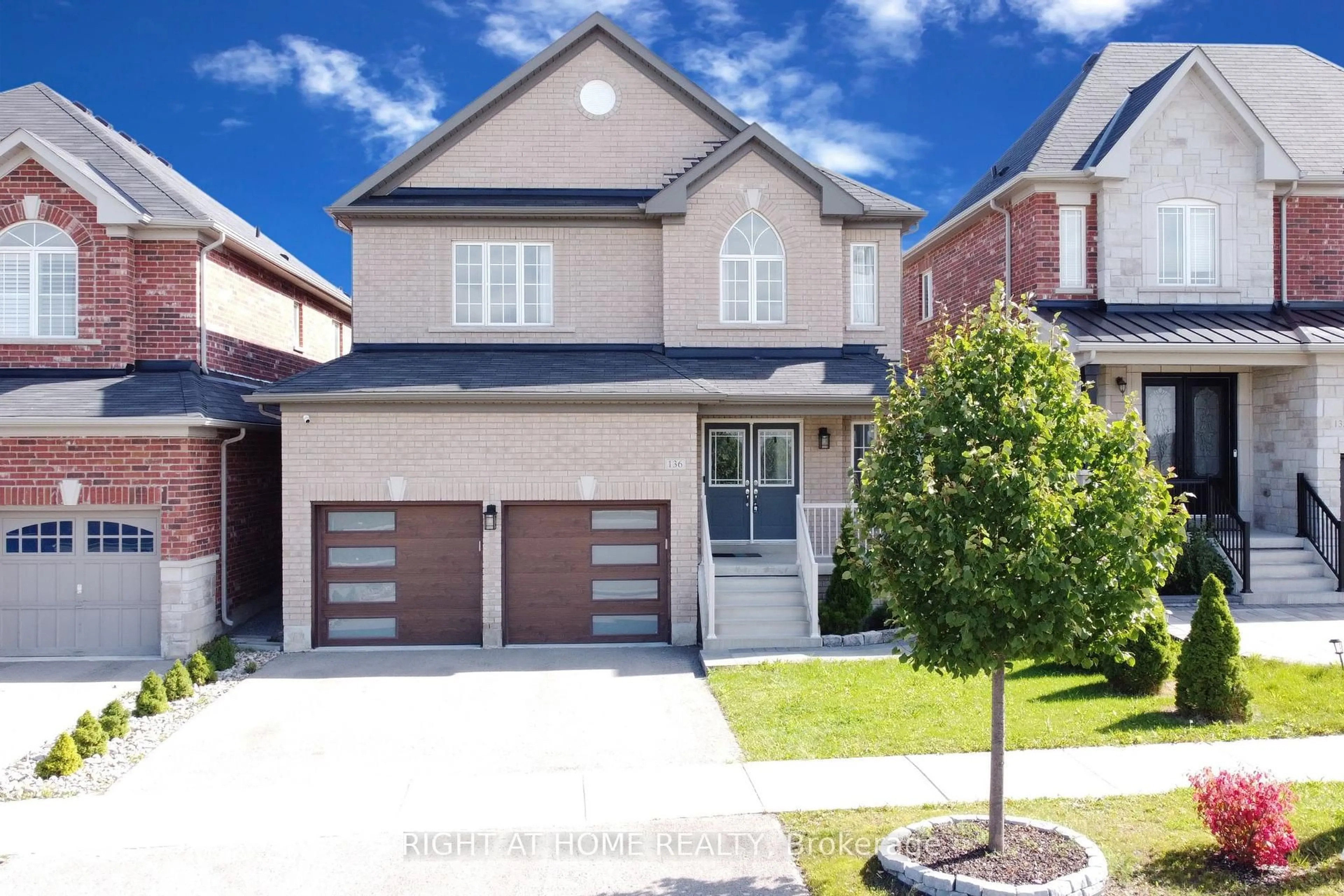 Home with brick exterior material, street for 136 Noble Dr, Bradford West Gwillimbury Ontario L3Z 2A5