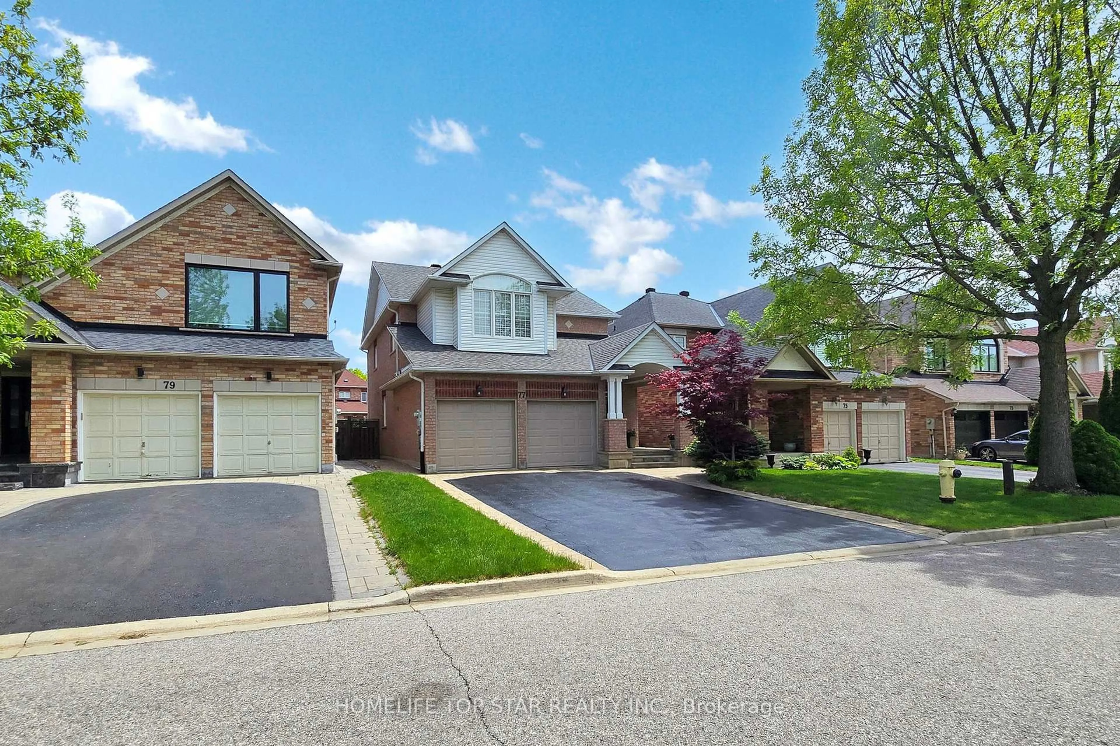 Home with brick exterior material, street for 77 Red Ash Dr, Markham Ontario L3S 4L2