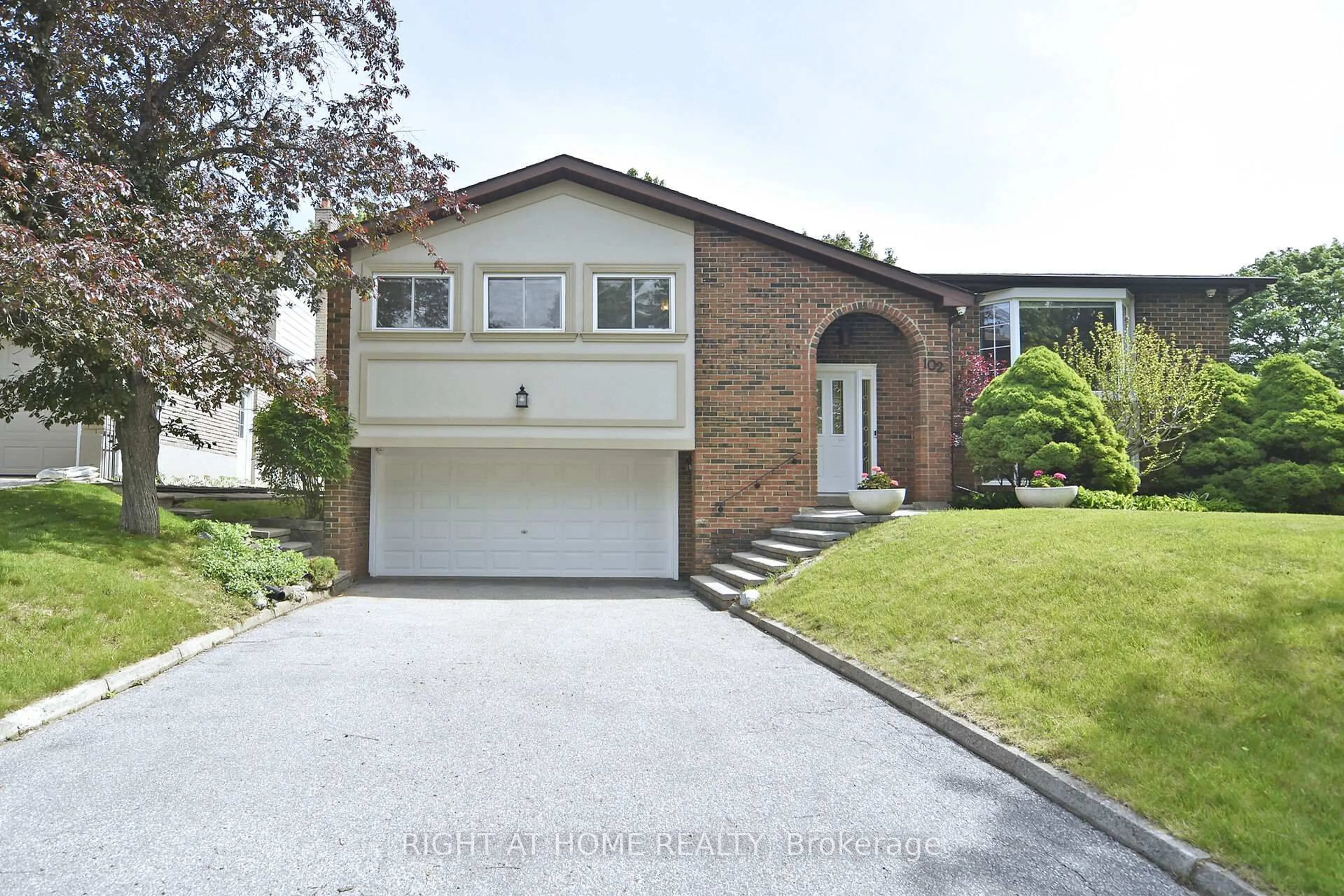 Home with brick exterior material, street for 102 Romfield Crct, Markham Ontario L3T 3H6