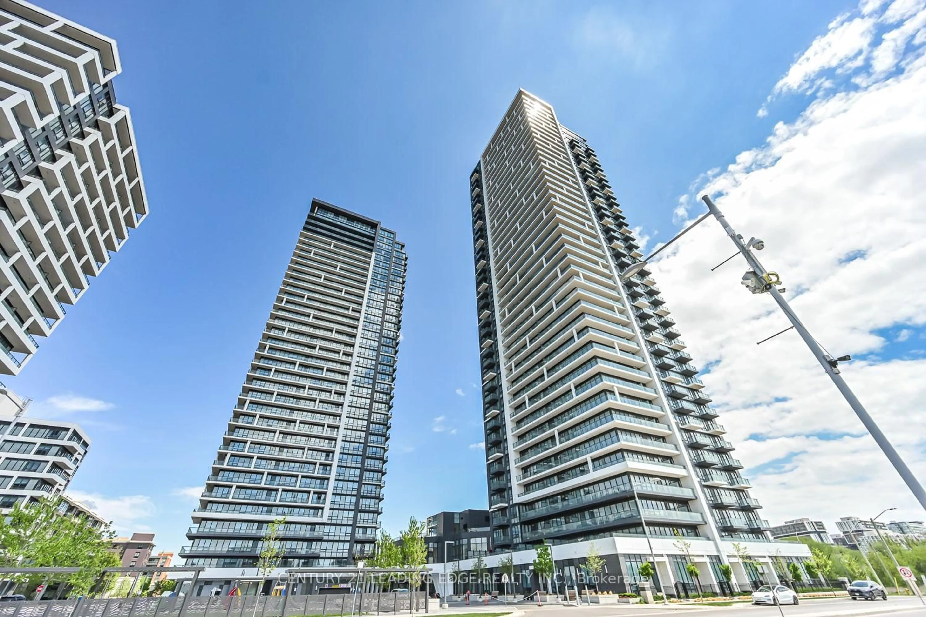 A pic from outside/outdoor area/front of a property/back of a property/a pic from drone, unknown for 18 Water Walk Dr #210, Markham Ontario L3R 6L5