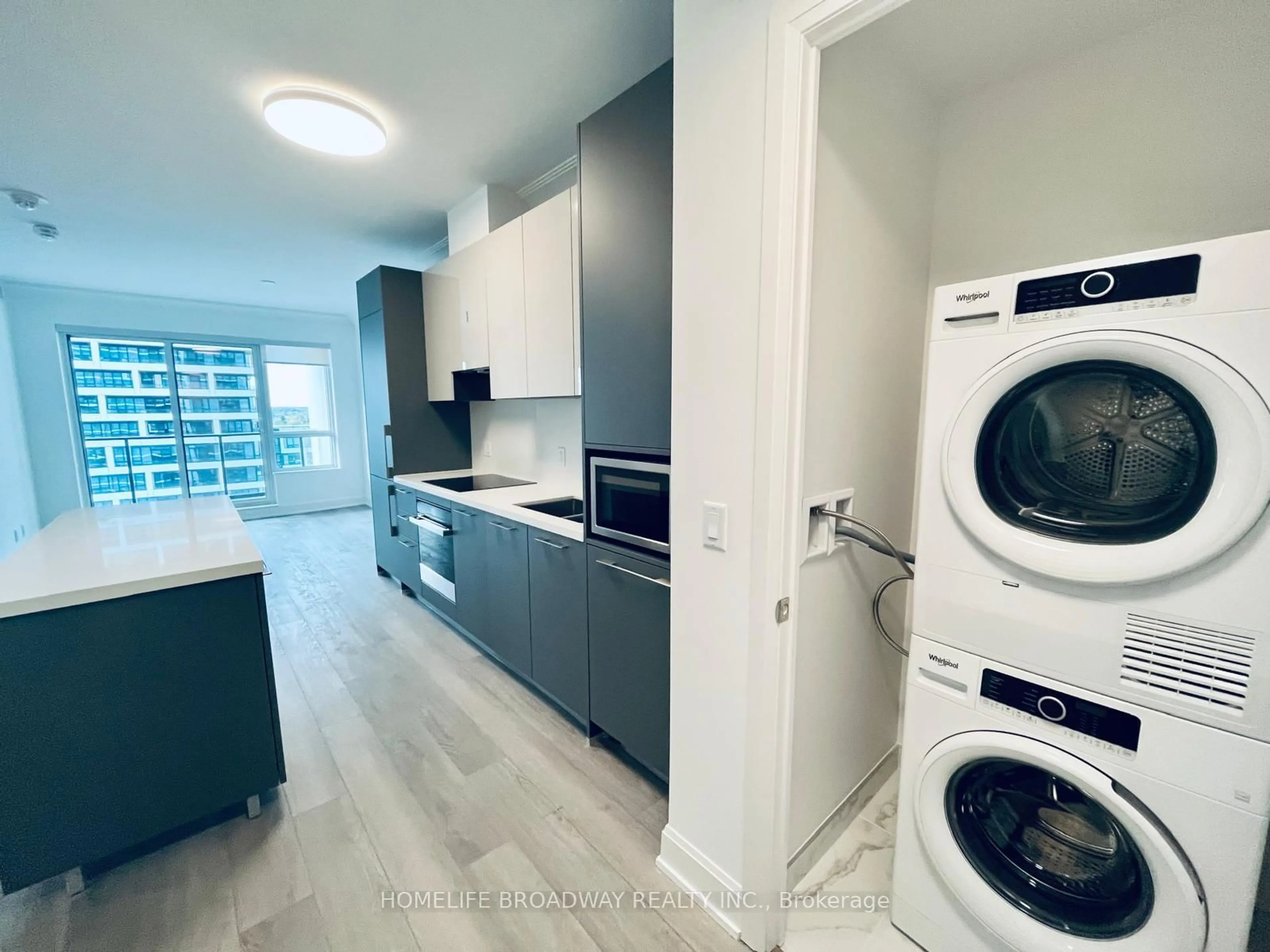 Kitchen with laundary machines, unknown for 8 Water Walk Dr #1209, Markham Ontario L3R 6L4