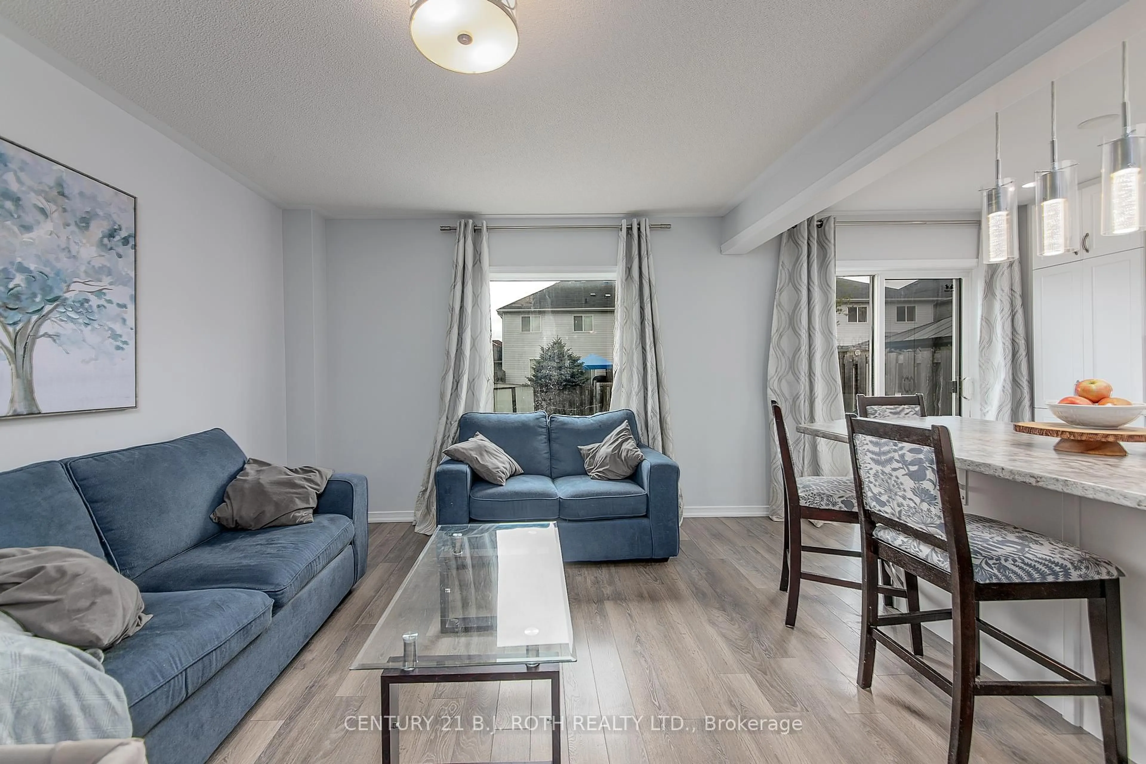 Living room with furniture, unknown for 123 Stonemount Cres, Essa Ontario L0M 1B4