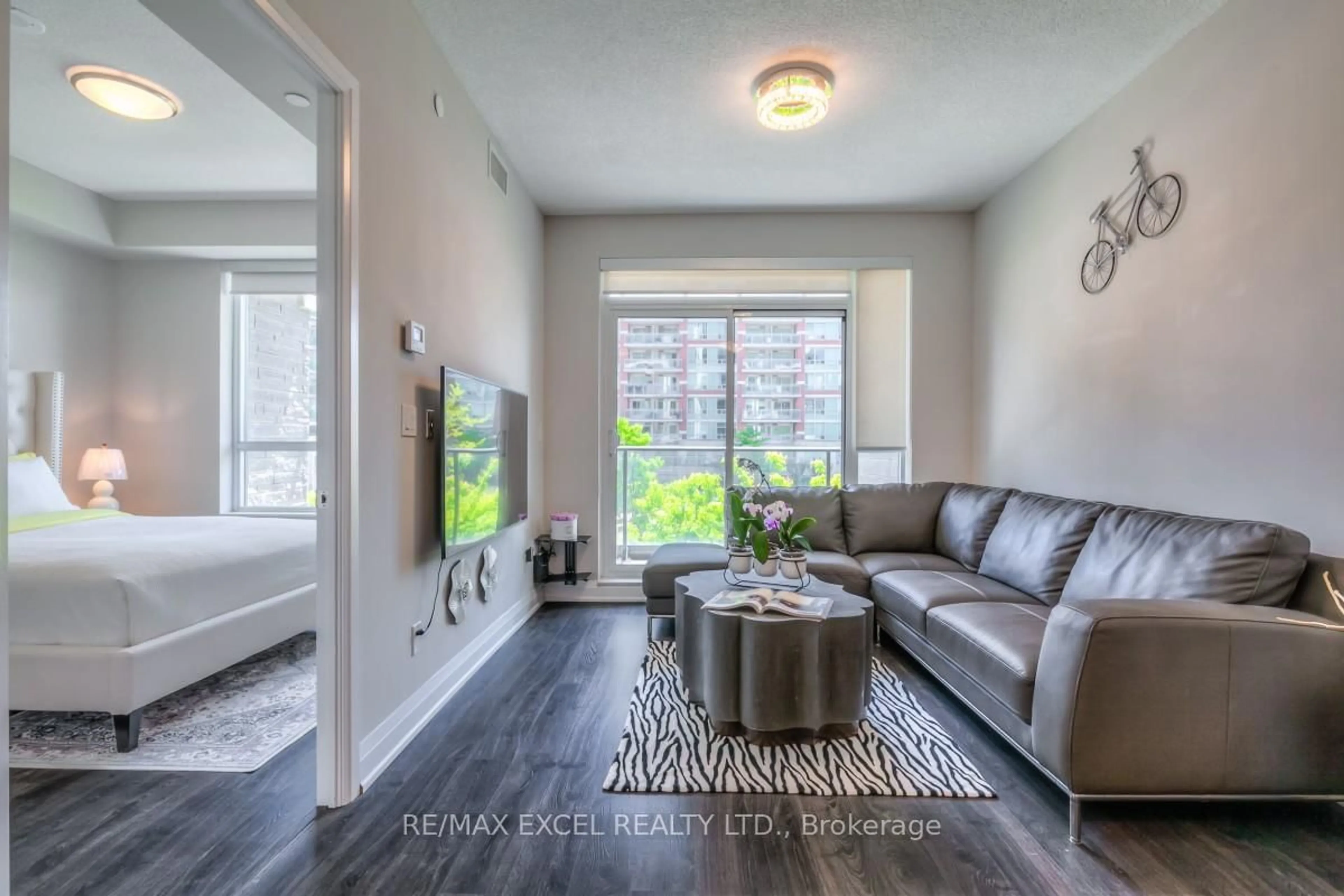 Living room with furniture, unknown for 396 Highway 7 N/A #208, Richmond Hill Ontario L4B 0G7