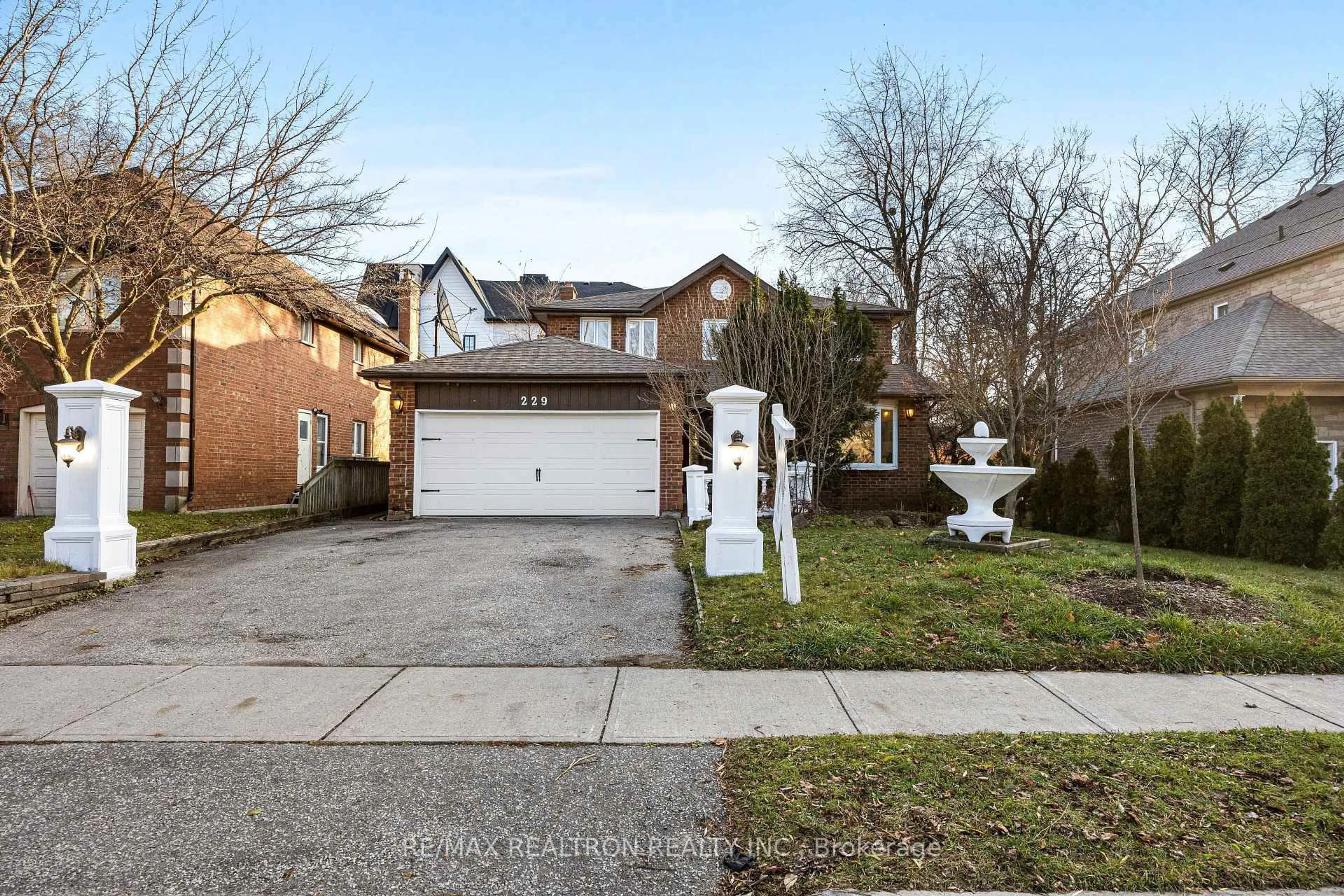 Home with brick exterior material, street for 229 Douglas Rd, Richmond Hill Ontario L4E 3H8