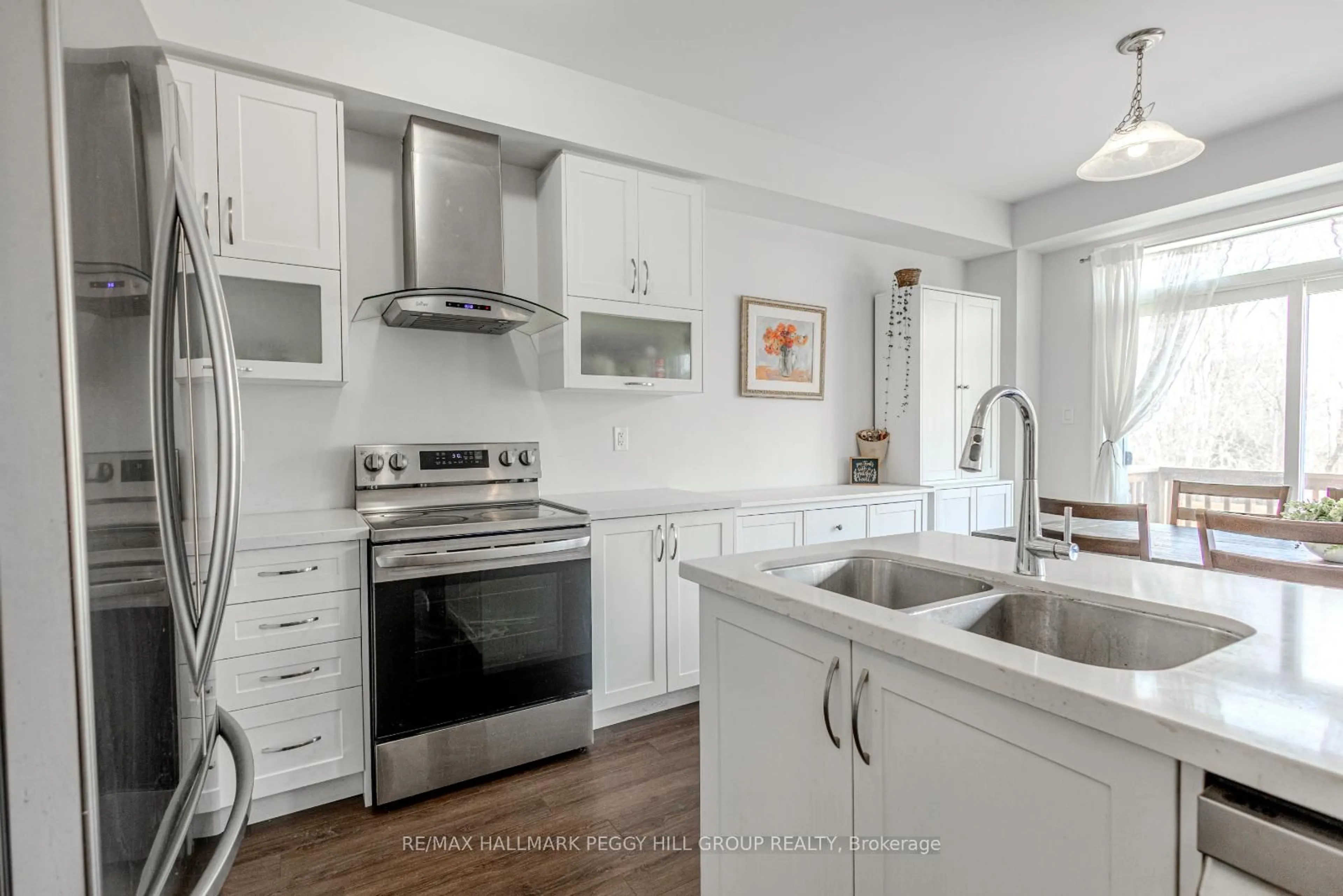 Open concept kitchen, ceramic/tile floor for 96 Wood Cres, Essa Ontario L3W 0M5