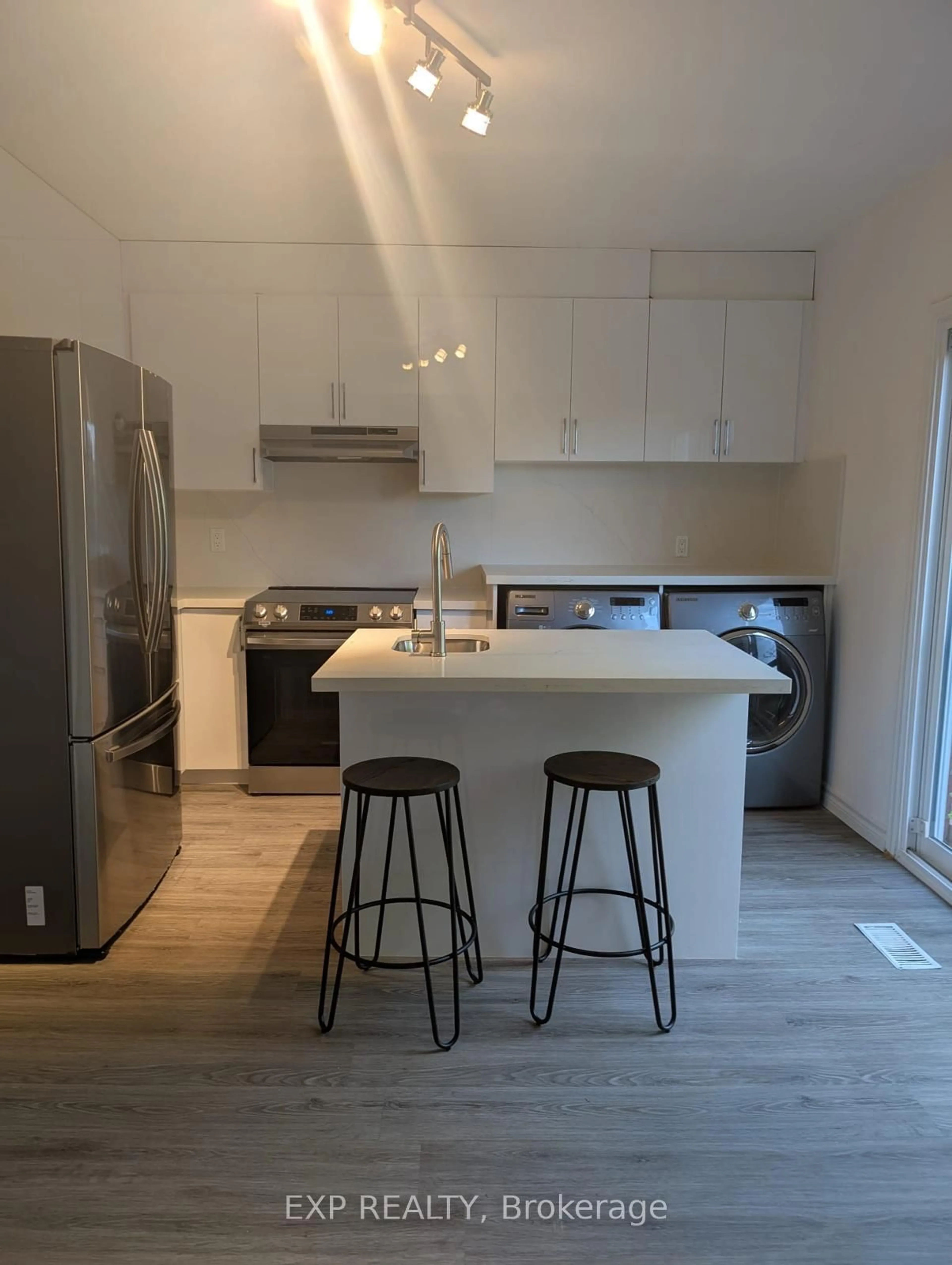 Open concept kitchen, wood/laminate floor for 201 Garden Ave, Georgina Ontario L4P 2L3