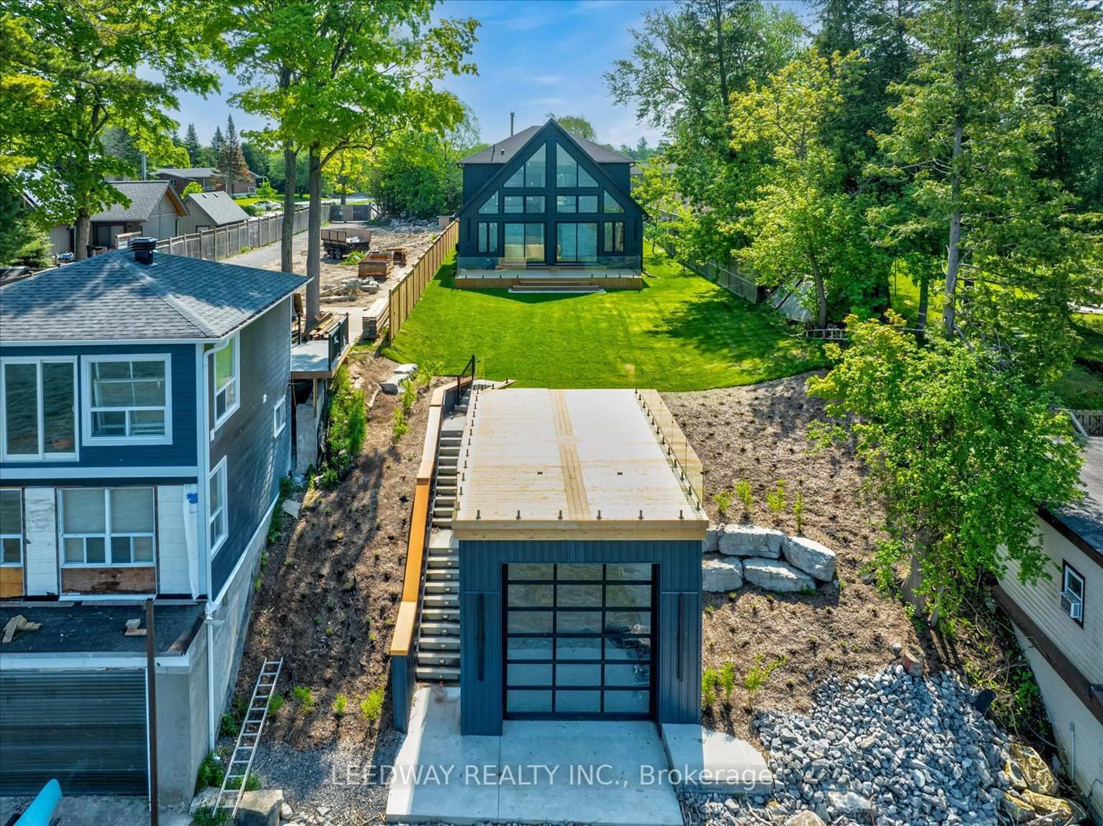 A pic from outside/outdoor area/front of a property/back of a property/a pic from drone, street for 24410 Thorah Park Blvd, Brock Ontario L0K 1A0