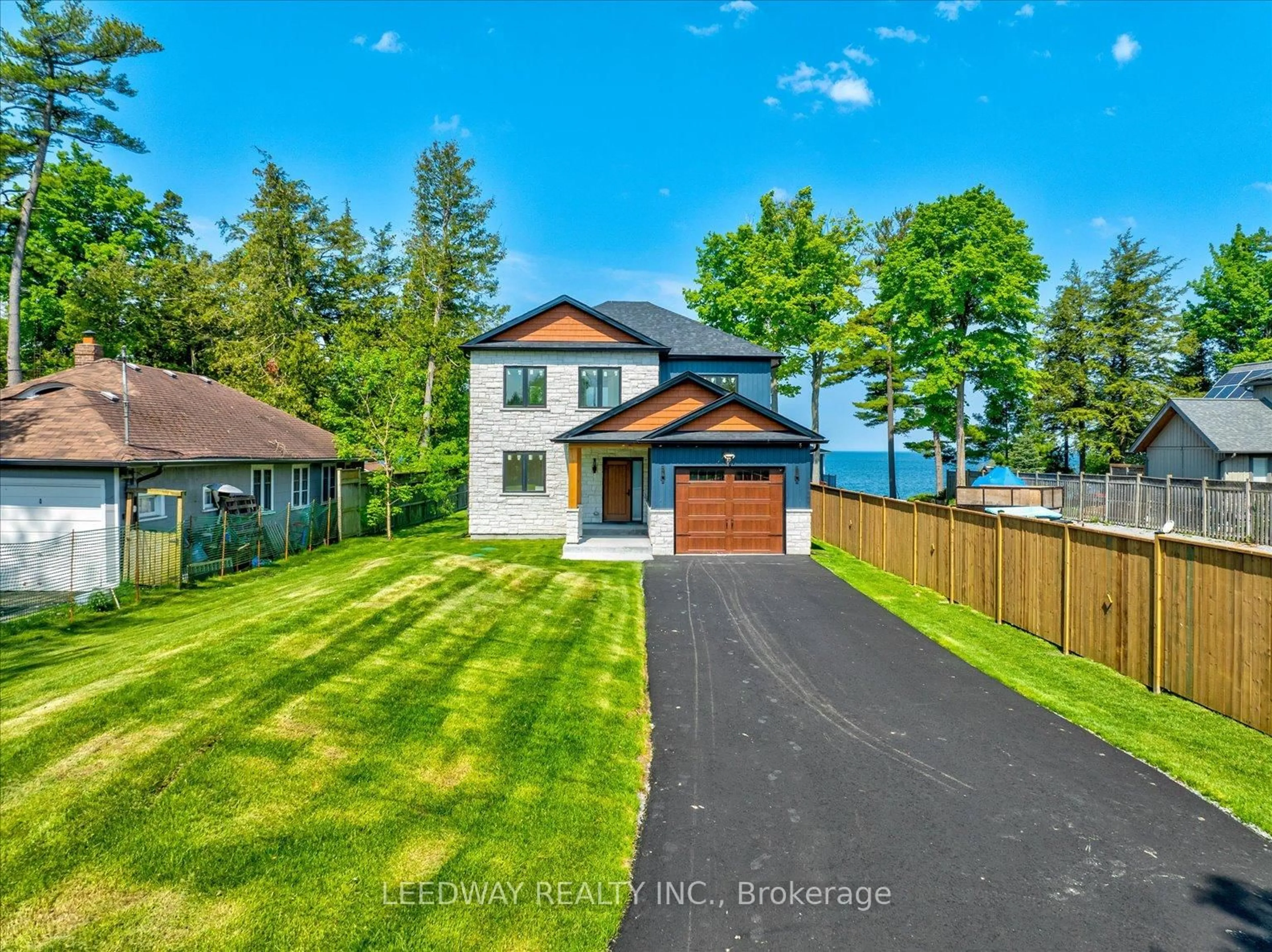 A pic from outside/outdoor area/front of a property/back of a property/a pic from drone, water/lake/river/ocean view for 24410 Thorah Park Blvd, Brock Ontario L0K 1A0