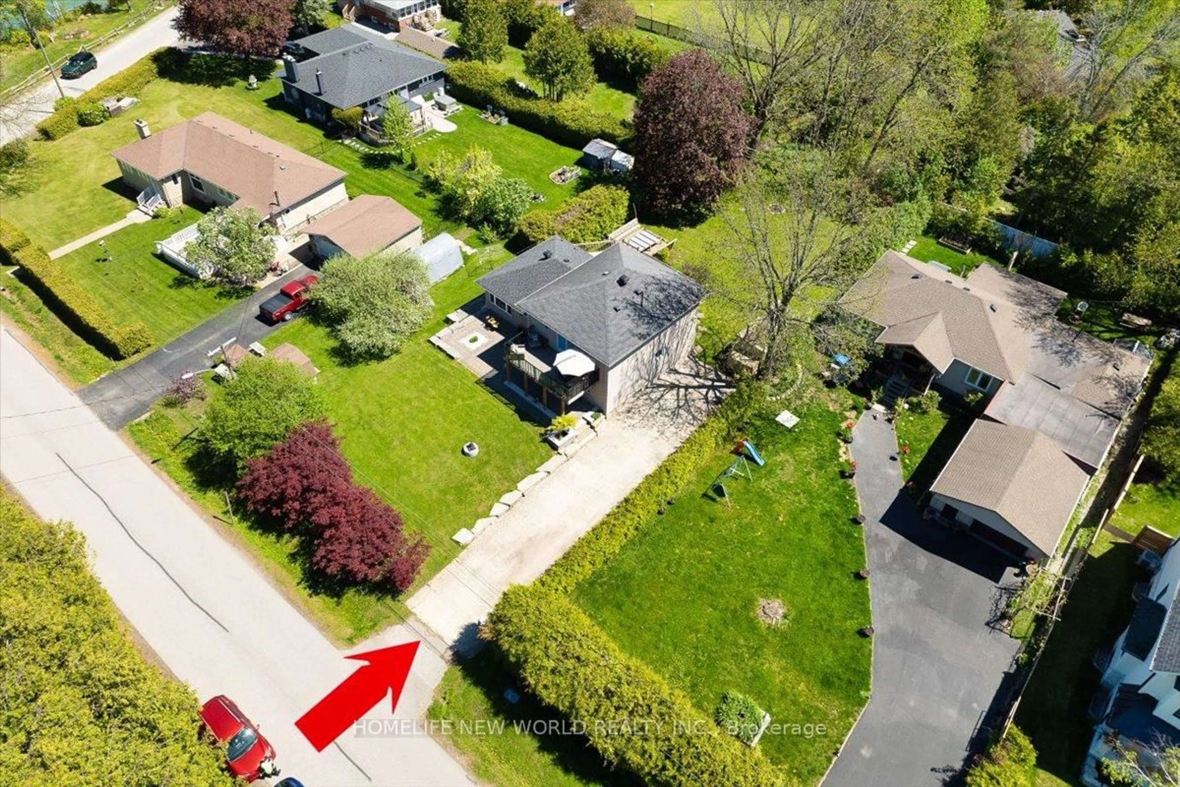 A pic from outside/outdoor area/front of a property/back of a property/a pic from drone, street for 853 Fairbank Ave, Georgina Ontario L0E 1S0