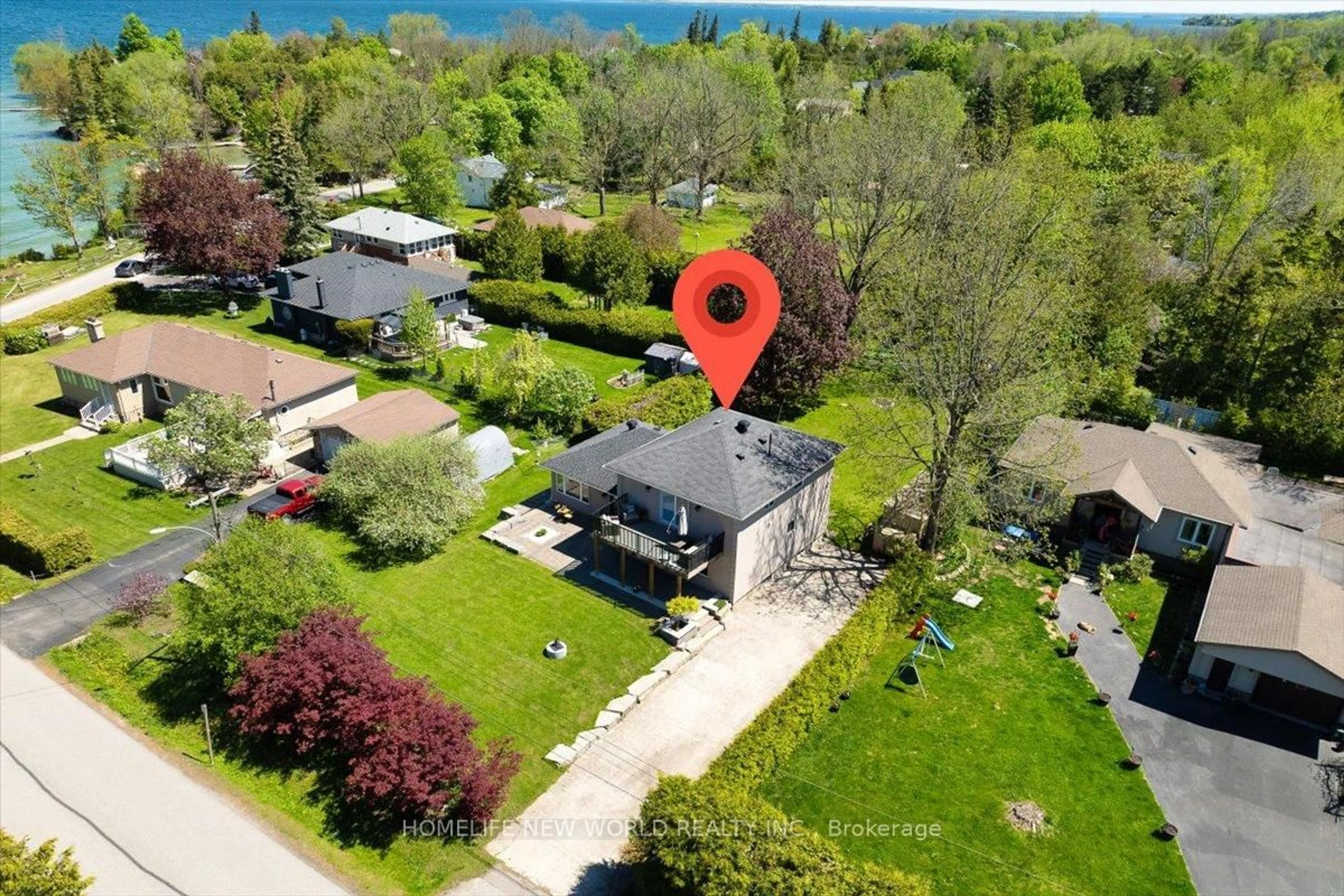 A pic from outside/outdoor area/front of a property/back of a property/a pic from drone, water/lake/river/ocean view for 853 Fairbank Ave, Georgina Ontario L0E 1S0