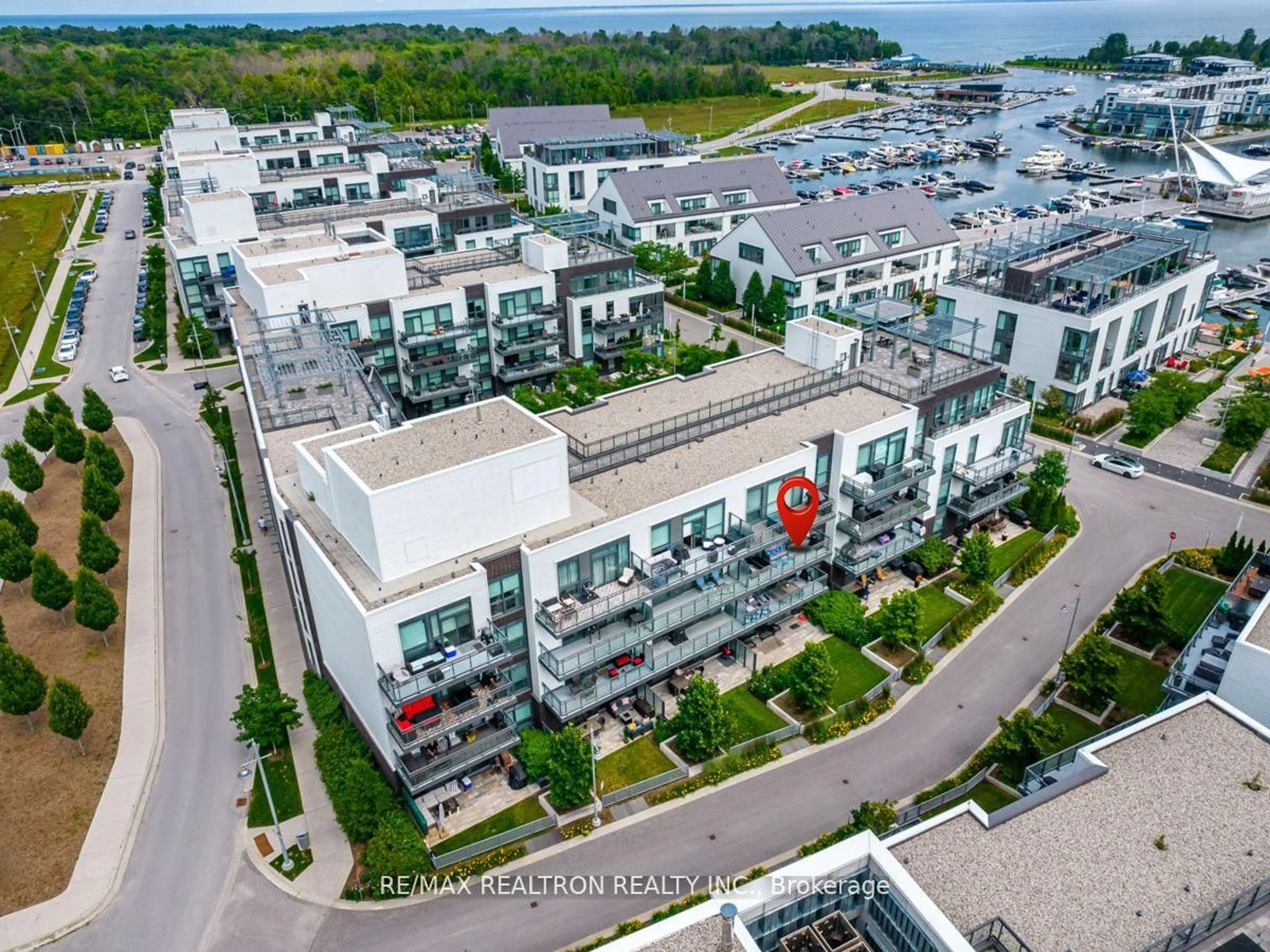 A pic from outside/outdoor area/front of a property/back of a property/a pic from drone, city buildings view from balcony for 301 Sea Ray Ave #C311, Innisfil Ontario L9S 0L8