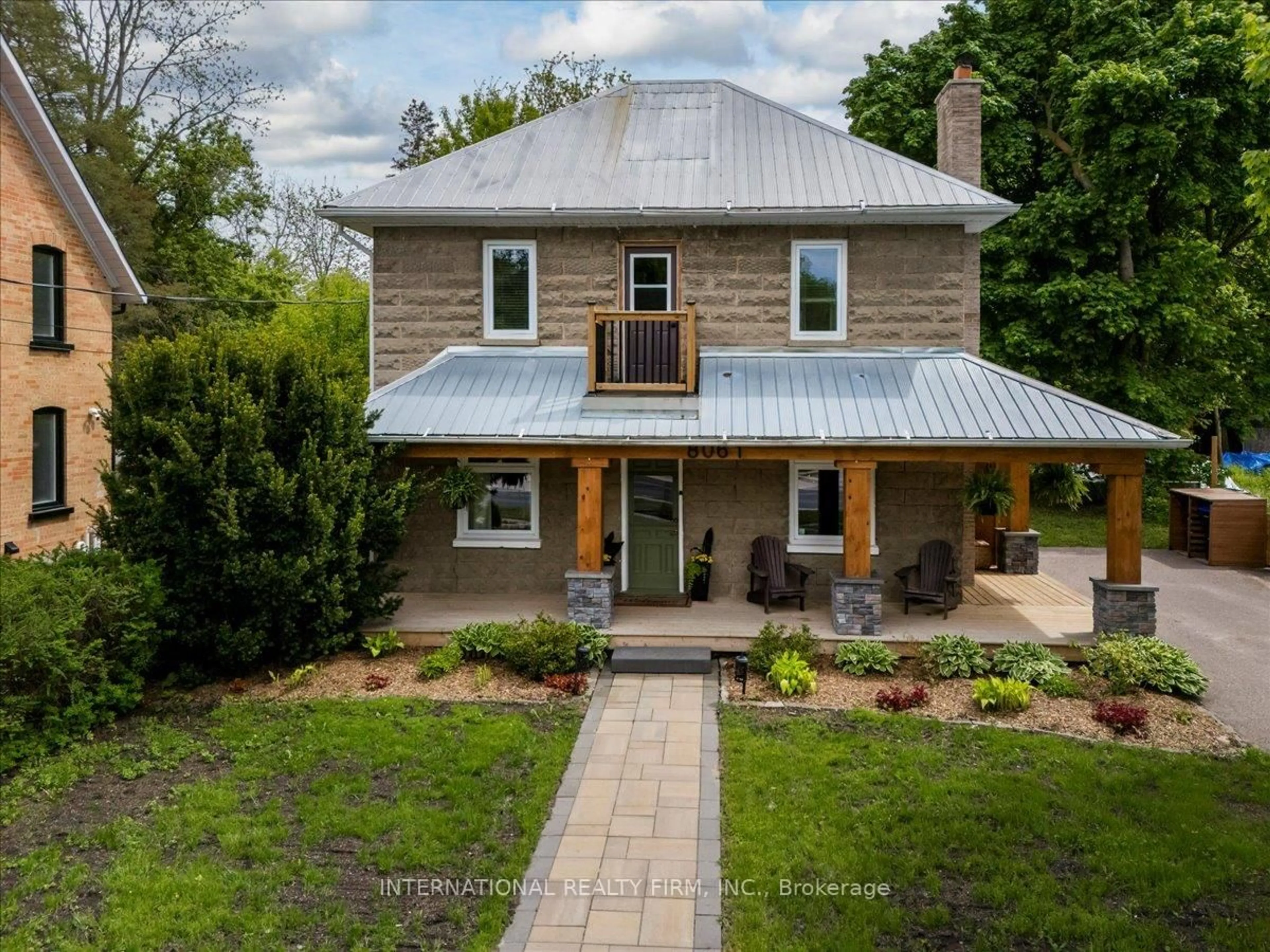 Home with brick exterior material, building for 8061 Main St, Adjala-Tosorontio Ontario L0M 1J0