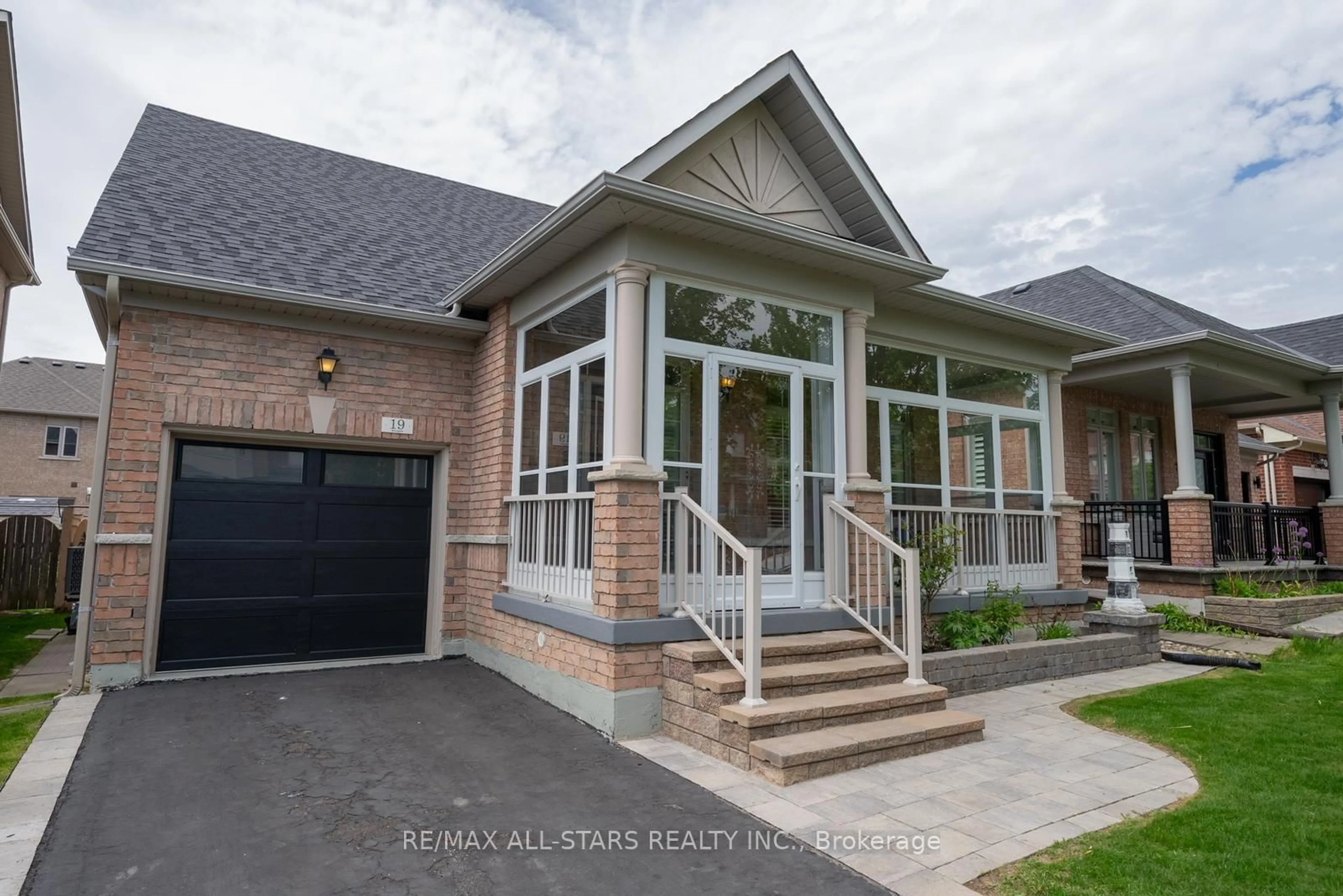 Home with brick exterior material, street for 19 Butterwood Lane, Whitchurch-Stouffville Ontario L4A 0M7