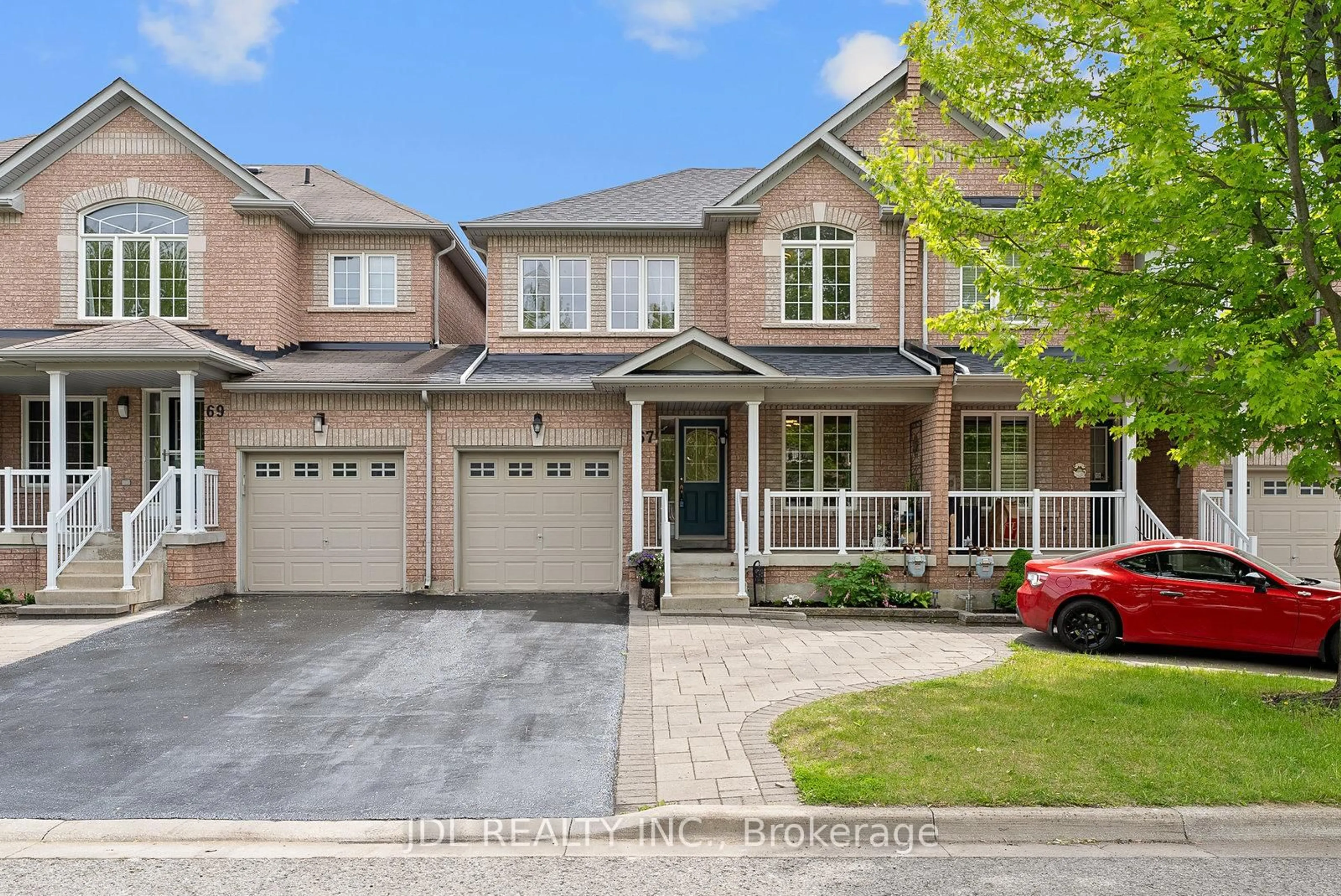 Home with brick exterior material, street for 67 Hawksbury Rd, Markham Ontario L6E 0E8